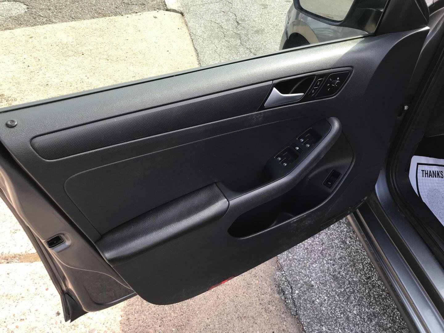 2013 Gray /Black Volkswagen Jetta S (3VW2K7AJ3DM) with an 2.0L L4 DOHC 20V engine, Automatic transmission, located at 577 Chester Pike, Prospect Park, PA, 19076, (610) 237-1015, 39.886154, -75.302338 - 2013 Volkswagen Jetta: Only 90k miles, great on gas, new PA inspection, runs LIKE NEW! This vehicle comes inspected and has been given a bumper to bumper safety check. It is very clean, reliable, and well maintained. We offer a unique pay plan that is known for being the easiest and fastest finan - Photo#7