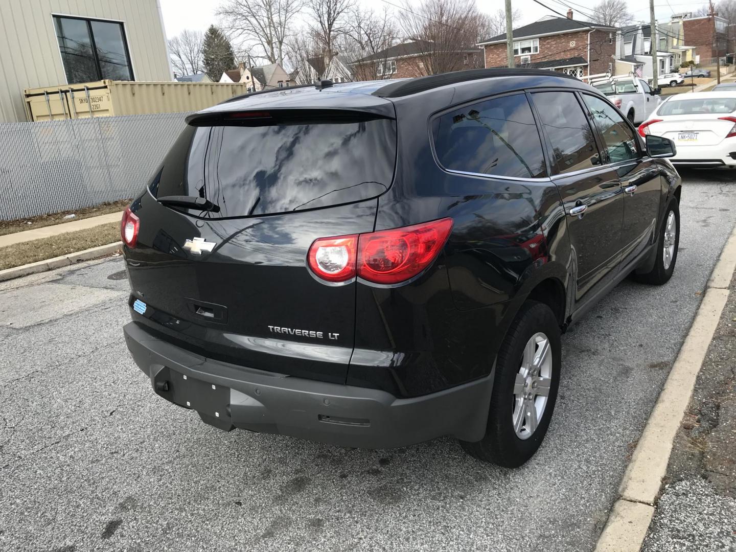 2011 Black /Gray Chevrolet Traverse LT AWD (1GNKVGED0BJ) with an 3.6L V6 DOHC 24V engine, 6-Speed Automatic transmission, located at 577 Chester Pike, Prospect Park, PA, 19076, (610) 237-1015, 39.886154, -75.302338 - 2011 Chevrolet Traverse LT: Only 121k miles, 3rd row seating, AWD, new PA inspection, runs LIKE NEW! This vehicle comes inspected and has been given a bumper to bumper safety check. It is very clean, reliable, and well maintained. We offer a unique pay plan that is known for being the easiest and - Photo#3