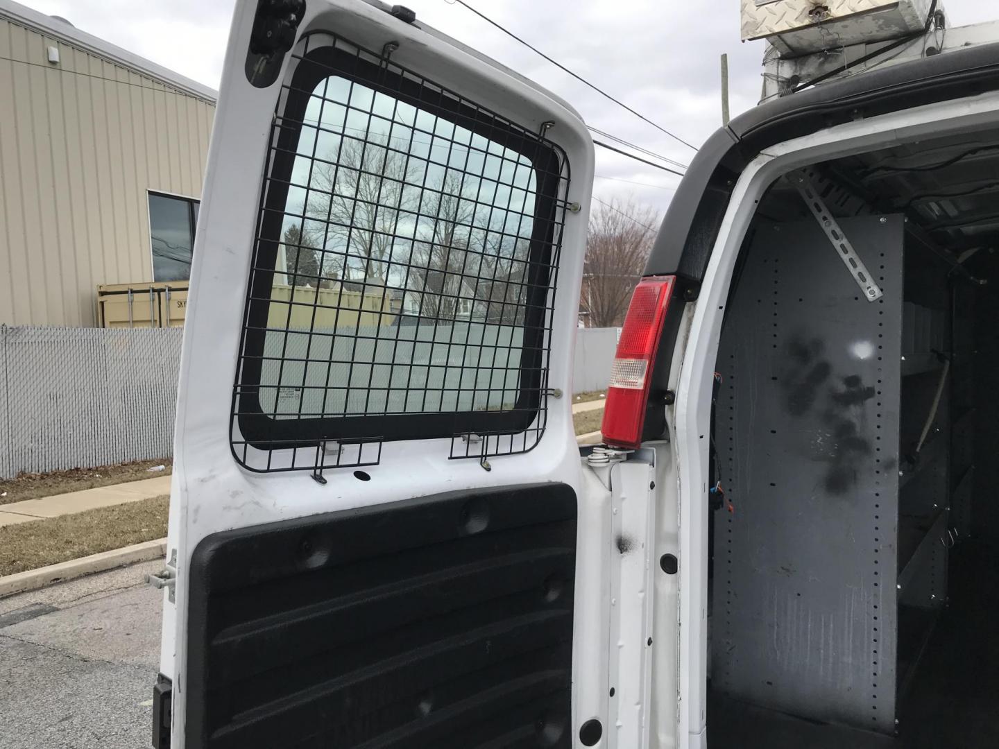 2017 White /Gray Chevrolet Express 2500 Cargo (1GCWGAFF2H1) with an 4.8L V8 FFV engine, 6A transmission, located at 577 Chester Pike, Prospect Park, PA, 19076, (610) 237-1015, 39.886154, -75.302338 - 2017 Chevrolet Express 2500 Cargo Van: Ladder racks, shelving, partition, cages over windows, new PA inspection, FLEET MAINTAINED, runs LIKE NEW! This vehicle comes inspected and has been given a bumper to bumper safety check. It is very clean, reliable, and well maintained. We offer a unique pay - Photo#14