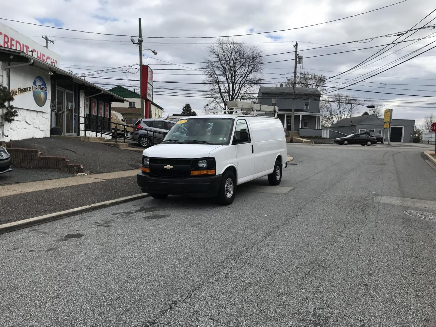 2017 White /Gray Chevrolet Express 2500 Cargo (1GCWGAFF2H1) with an 4.8L V8 FFV engine, 6A transmission, located at 577 Chester Pike, Prospect Park, PA, 19076, (610) 237-1015, 39.886154, -75.302338 - 2017 Chevrolet Express 2500 Cargo Van: Ladder racks, shelving, partition, cages over windows, new PA inspection, FLEET MAINTAINED, runs LIKE NEW! This vehicle comes inspected and has been given a bumper to bumper safety check. It is very clean, reliable, and well maintained. We offer a unique pay - Photo#2