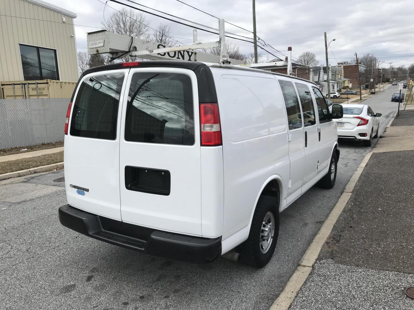 2017 White /Gray Chevrolet Express 2500 Cargo (1GCWGAFF2H1) with an 4.8L V8 FFV engine, 6A transmission, located at 577 Chester Pike, Prospect Park, PA, 19076, (610) 237-1015, 39.886154, -75.302338 - 2017 Chevrolet Express 2500 Cargo Van: Ladder racks, shelving, partition, cages over windows, new PA inspection, FLEET MAINTAINED, runs LIKE NEW! This vehicle comes inspected and has been given a bumper to bumper safety check. It is very clean, reliable, and well maintained. We offer a unique pay - Photo#3