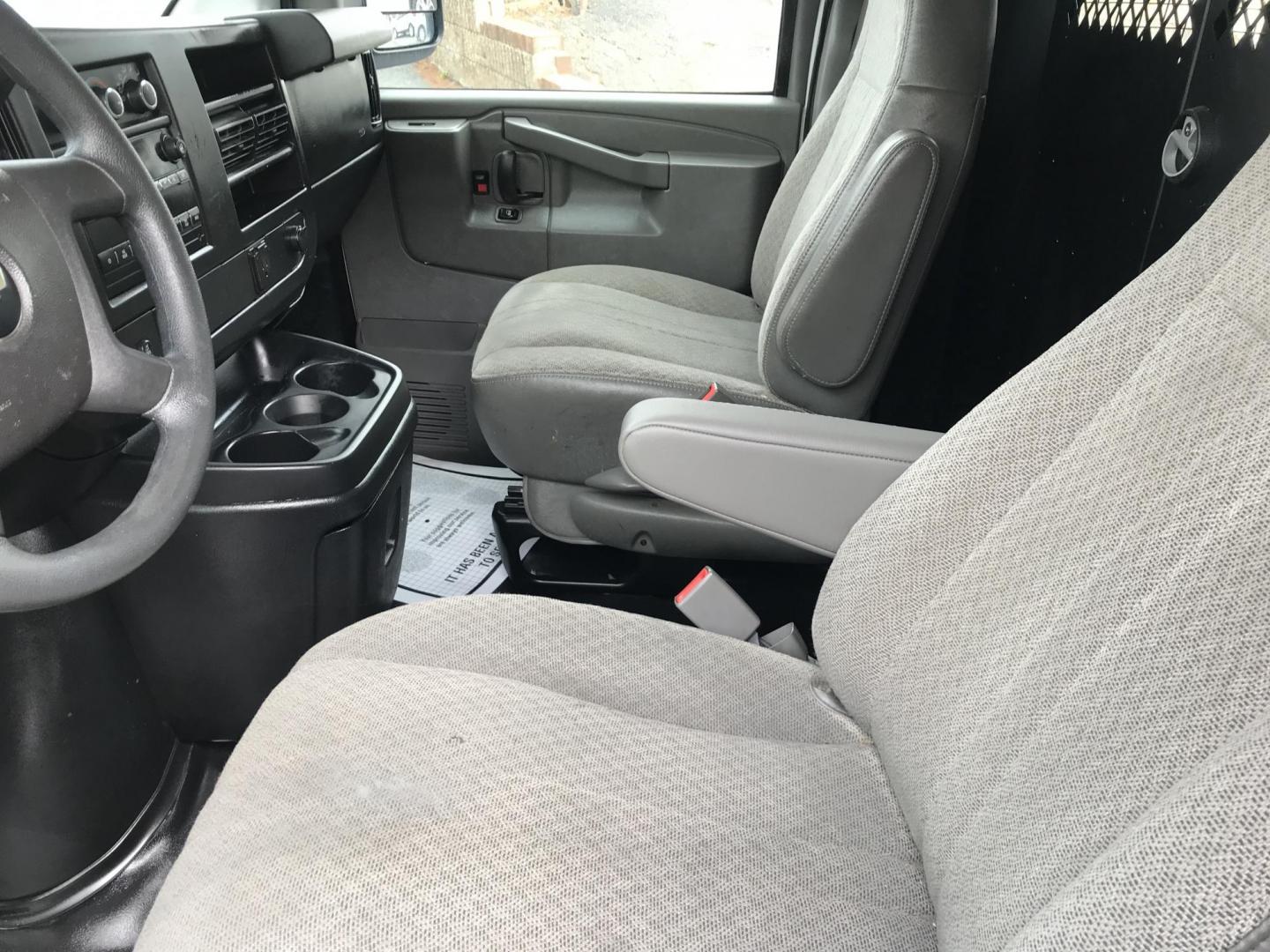 2017 White /Gray Chevrolet Express 2500 Cargo (1GCWGAFF2H1) with an 4.8L V8 FFV engine, 6A transmission, located at 577 Chester Pike, Prospect Park, PA, 19076, (610) 237-1015, 39.886154, -75.302338 - 2017 Chevrolet Express 2500 Cargo Van: Ladder racks, shelving, partition, cages over windows, new PA inspection, FLEET MAINTAINED, runs LIKE NEW! This vehicle comes inspected and has been given a bumper to bumper safety check. It is very clean, reliable, and well maintained. We offer a unique pay - Photo#9