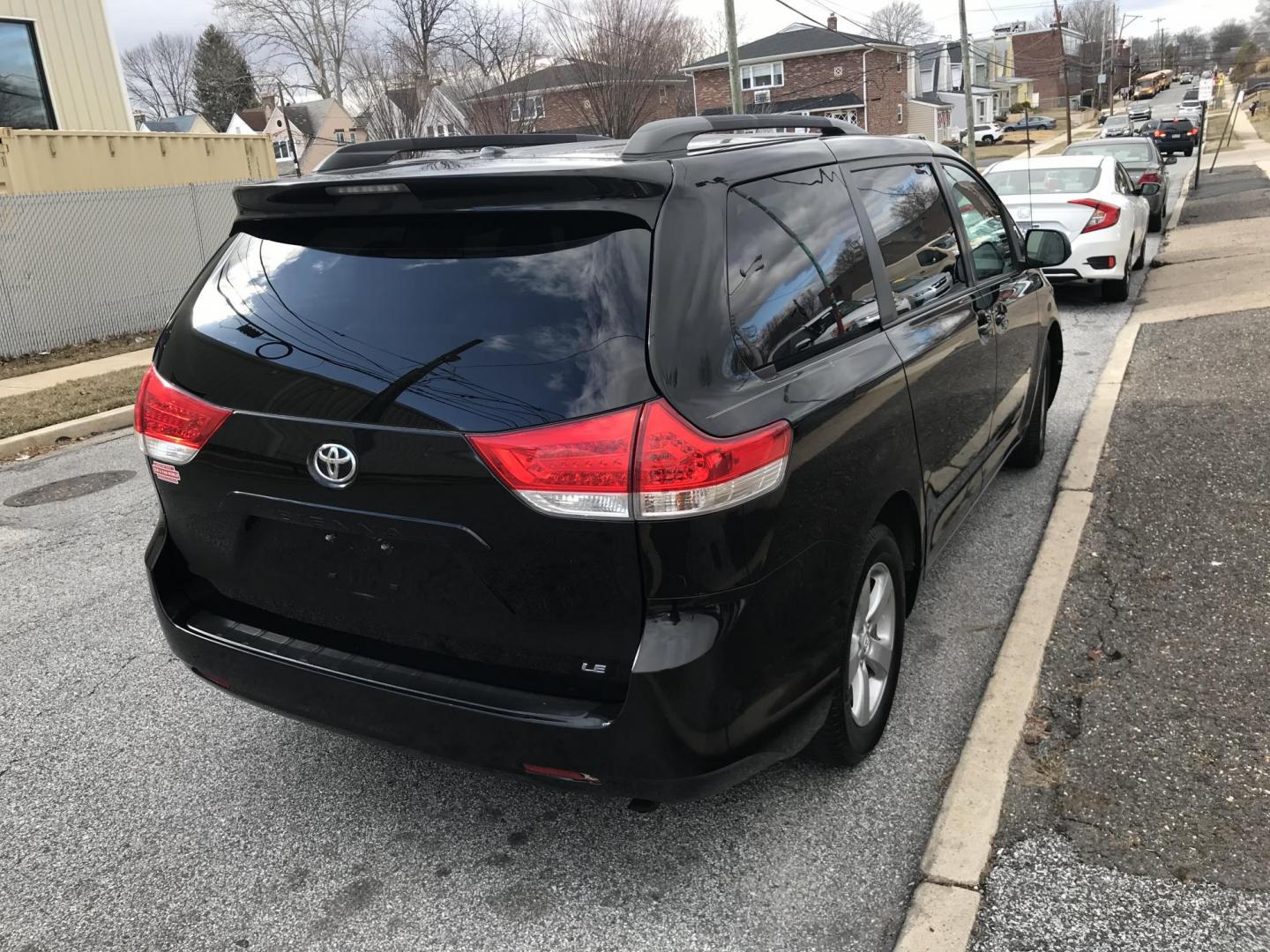 2013 Black /Gray Toyota Sienna LE FWD V6 (5TDKK3DC7DS) with an 3.5L V6 EFI DOHC 24V engine, 5-Speed Automatic transmission, located at 577 Chester Pike, Prospect Park, PA, 19076, (610) 237-1015, 39.886154, -75.302338 - 2013 Toyota Sienna LE: New PA inspection, SUPER CLEAN, runs LIKE NEW! This vehicle comes inspected and has been given a bumper to bumper safety check. It is very clean, reliable, and well maintained. We offer a unique pay plan that is known for being the easiest and fastest financing option in th - Photo#4