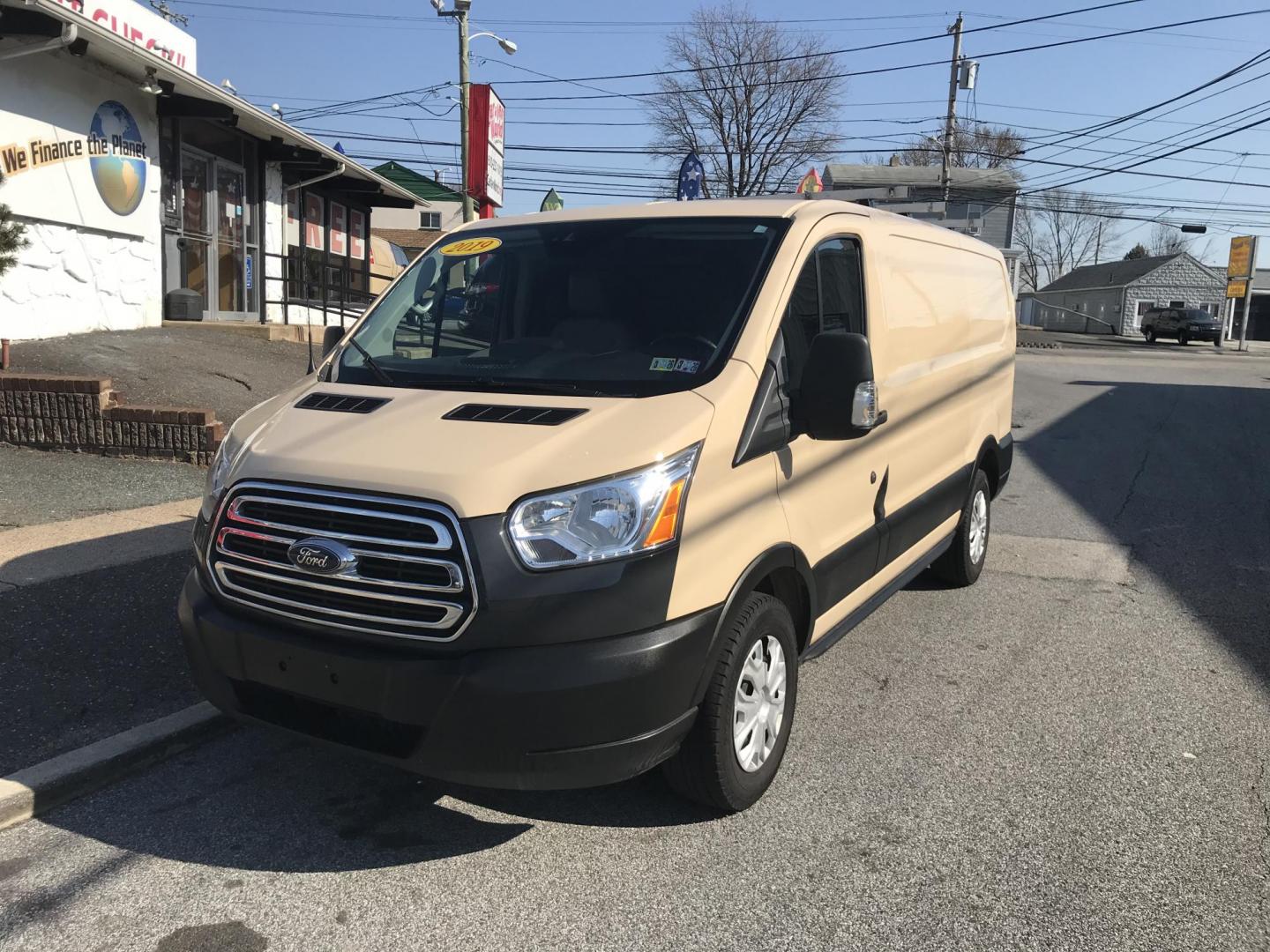 2019 Tan /Gray Ford Transit 150 Van Low Roof w/Sliding Pass. 130-in. WB (1FTYE1YM4KK) with an 3.7L V6 DOHC 24V engine, 6A transmission, located at 577 Chester Pike, Prospect Park, PA, 19076, (610) 237-1015, 39.886154, -75.302338 - Photo#2