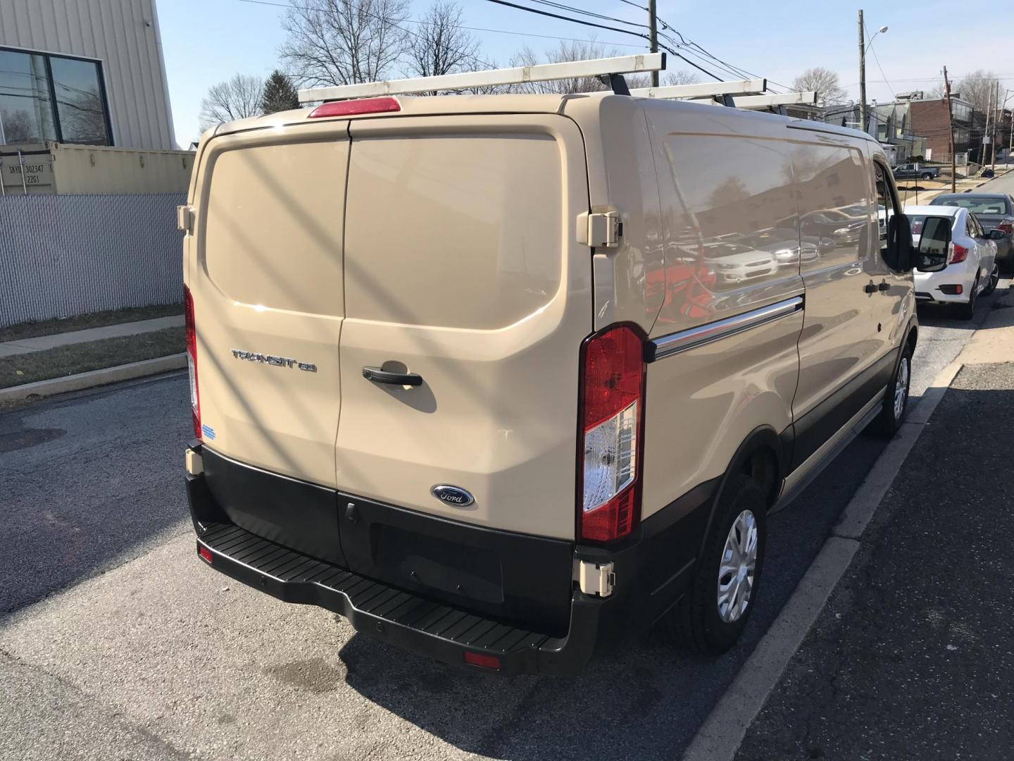 2019 Tan /Gray Ford Transit 150 Van Low Roof w/Sliding Pass. 130-in. WB (1FTYE1YM4KK) with an 3.7L V6 DOHC 24V engine, 6A transmission, located at 577 Chester Pike, Prospect Park, PA, 19076, (610) 237-1015, 39.886154, -75.302338 - Photo#5
