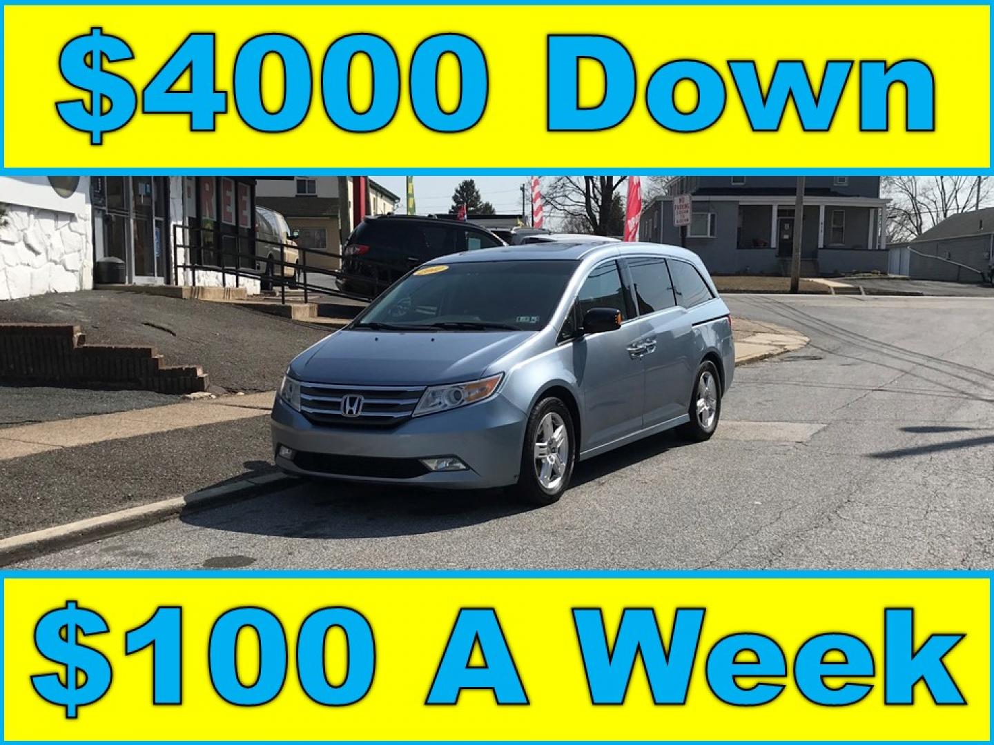 2012 Blue /Gray Honda Odyssey Touring (5FNRL5H9XCB) with an 3.5L V6 SOHC 24V engine, 5-Speed Automatic transmission, located at 577 Chester Pike, Prospect Park, PA, 19076, (610) 237-1015, 39.886154, -75.302338 - Photo#0