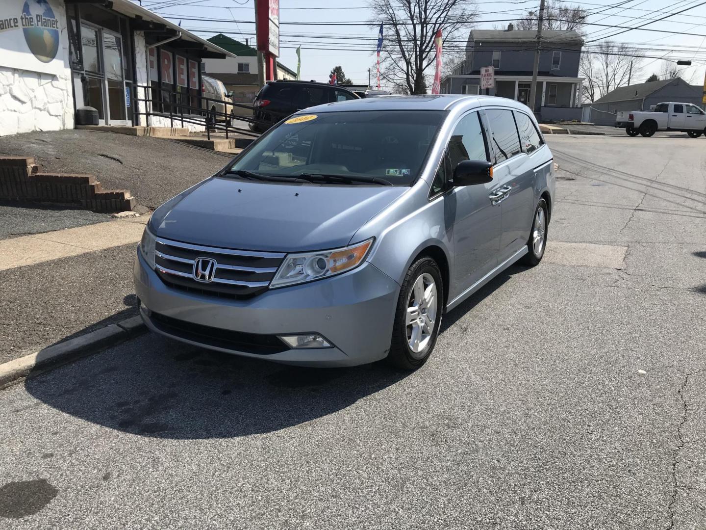 2012 Blue /Gray Honda Odyssey Touring (5FNRL5H9XCB) with an 3.5L V6 SOHC 24V engine, 5-Speed Automatic transmission, located at 577 Chester Pike, Prospect Park, PA, 19076, (610) 237-1015, 39.886154, -75.302338 - Photo#1