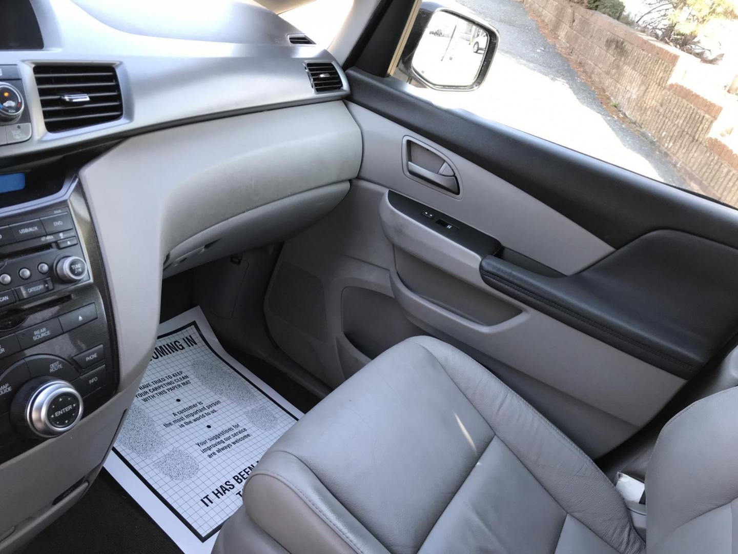 2012 Blue /Gray Honda Odyssey Touring (5FNRL5H9XCB) with an 3.5L V6 SOHC 24V engine, 5-Speed Automatic transmission, located at 577 Chester Pike, Prospect Park, PA, 19076, (610) 237-1015, 39.886154, -75.302338 - Photo#17