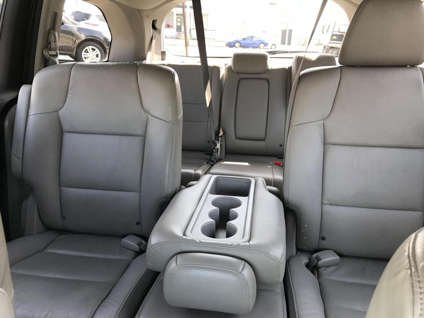 2012 Blue /Gray Honda Odyssey Touring (5FNRL5H9XCB) with an 3.5L V6 SOHC 24V engine, 5-Speed Automatic transmission, located at 577 Chester Pike, Prospect Park, PA, 19076, (610) 237-1015, 39.886154, -75.302338 - Photo#19