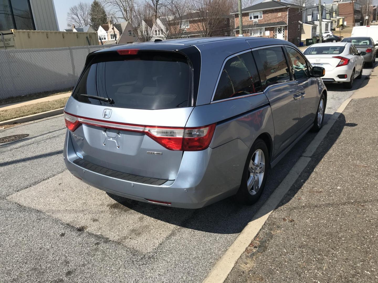 2012 Blue /Gray Honda Odyssey Touring (5FNRL5H9XCB) with an 3.5L V6 SOHC 24V engine, 5-Speed Automatic transmission, located at 577 Chester Pike, Prospect Park, PA, 19076, (610) 237-1015, 39.886154, -75.302338 - Photo#4