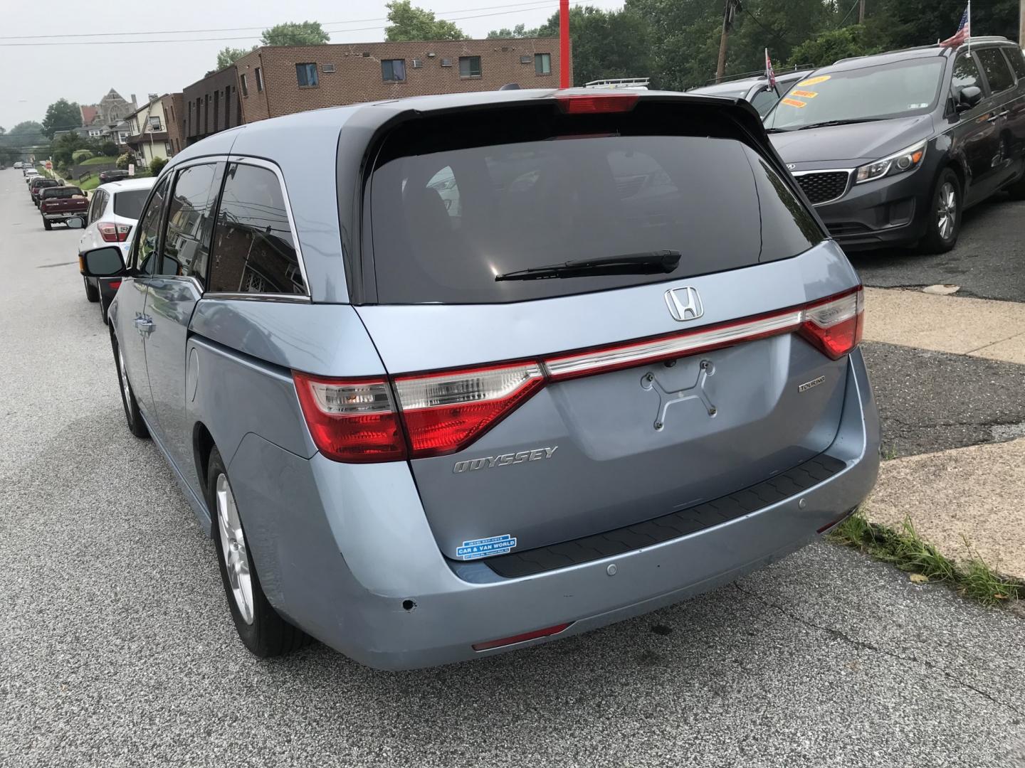 2012 Blue /Gray Honda Odyssey Touring (5FNRL5H9XCB) with an 3.5L V6 SOHC 24V engine, 5-Speed Automatic transmission, located at 577 Chester Pike, Prospect Park, PA, 19076, (610) 237-1015, 39.886154, -75.302338 - 2012 Honda Odyssey Touring 155k miles • DVD Player. Navigation System. Example Financing: • $3,000 Down • $100 Weekly • $200 Bi-Weekly We finance our own vehicles. We do not obtain or review traditional consumer credit reports. Financing decisions are based on verified income, ability- Photo#5