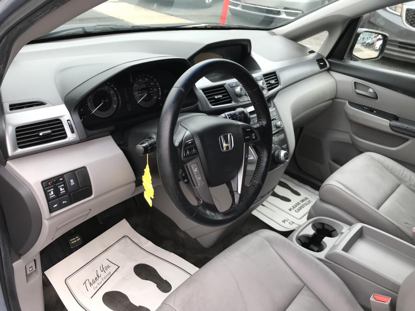 2012 Blue /Gray Honda Odyssey Touring (5FNRL5H9XCB) with an 3.5L V6 SOHC 24V engine, 5-Speed Automatic transmission, located at 577 Chester Pike, Prospect Park, PA, 19076, (610) 237-1015, 39.886154, -75.302338 - 2012 Honda Odyssey Touring 155k miles • DVD Player. Navigation System. Example Financing: • $3,000 Down • $100 Weekly • $200 Bi-Weekly We finance our own vehicles. We do not obtain or review traditional consumer credit reports. Financing decisions are based on verified income, ability- Photo#12
