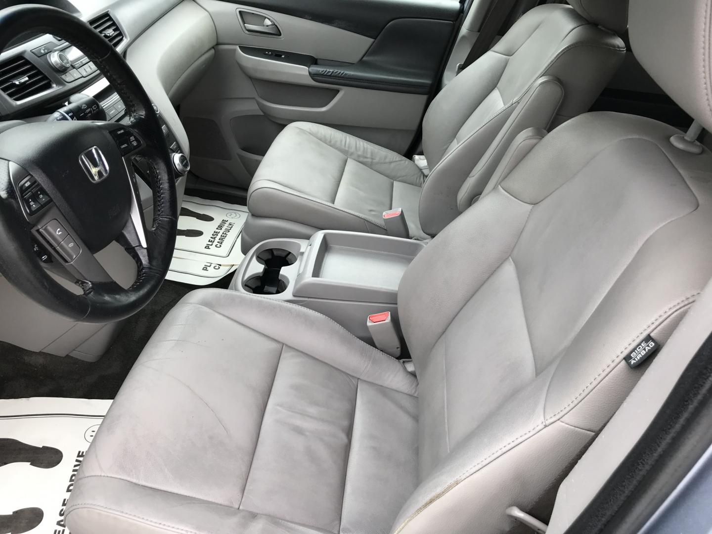 2012 Blue /Gray Honda Odyssey Touring (5FNRL5H9XCB) with an 3.5L V6 SOHC 24V engine, 5-Speed Automatic transmission, located at 577 Chester Pike, Prospect Park, PA, 19076, (610) 237-1015, 39.886154, -75.302338 - 2012 Honda Odyssey Touring 155k miles • DVD Player. Navigation System. Example Financing: • $3,000 Down • $100 Weekly • $200 Bi-Weekly We finance our own vehicles. We do not obtain or review traditional consumer credit reports. Financing decisions are based on verified income, ability- Photo#11