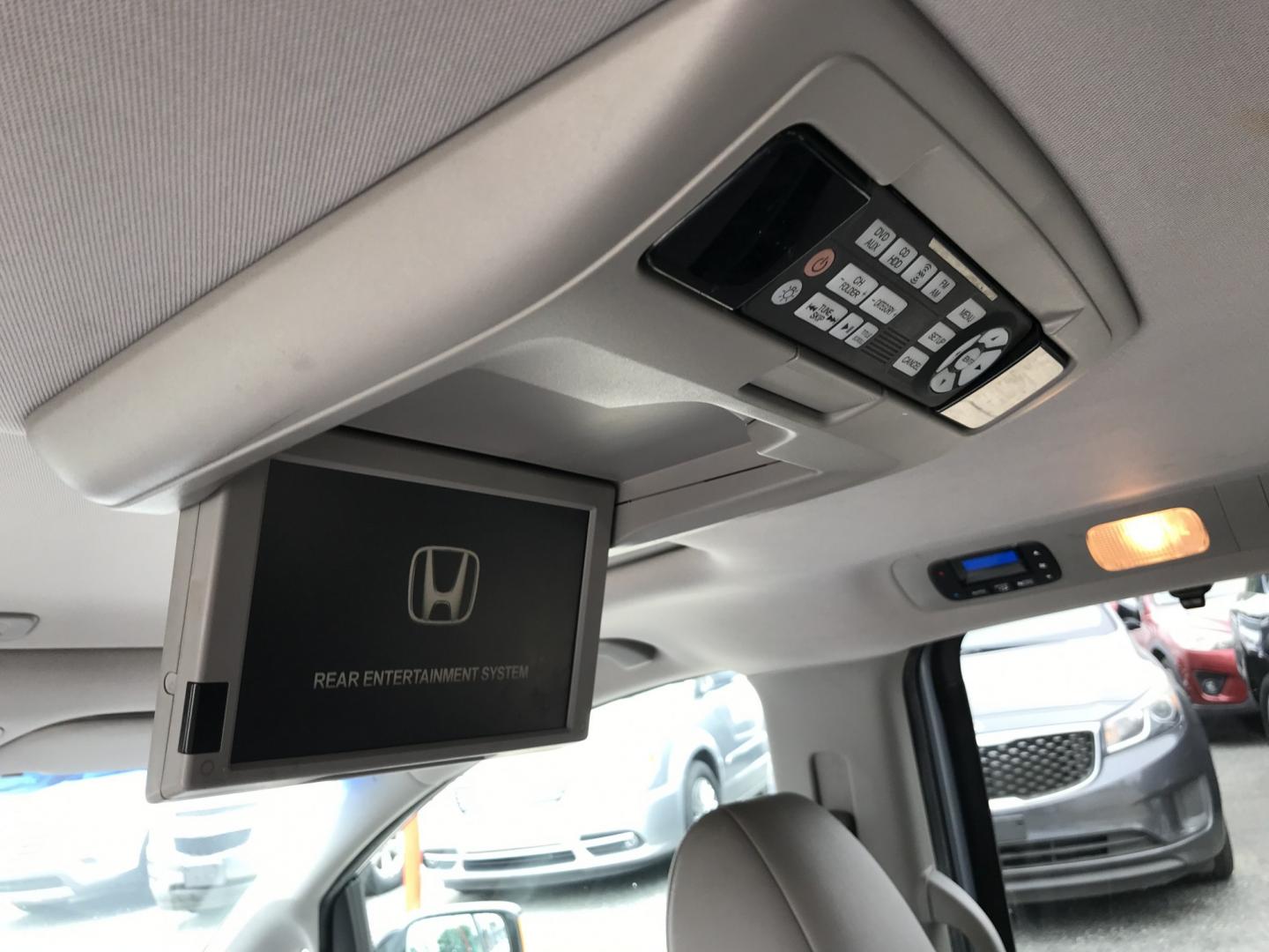 2012 Blue /Gray Honda Odyssey Touring (5FNRL5H9XCB) with an 3.5L V6 SOHC 24V engine, 5-Speed Automatic transmission, located at 577 Chester Pike, Prospect Park, PA, 19076, (610) 237-1015, 39.886154, -75.302338 - 2012 Honda Odyssey Touring 155k miles • DVD Player. Navigation System. Example Financing: • $3,000 Down • $100 Weekly • $200 Bi-Weekly We finance our own vehicles. We do not obtain or review traditional consumer credit reports. Financing decisions are based on verified income, ability- Photo#21