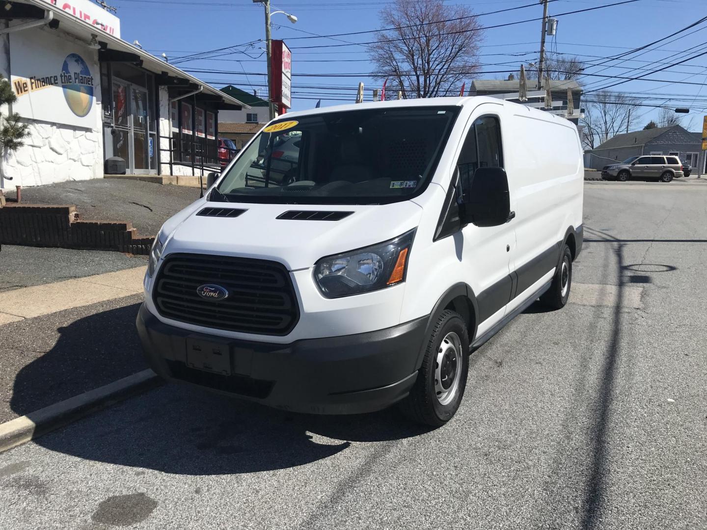 2017 White /Gray Ford Transit 150 Van Low Roof 60/40 Pass. 130-in. WB (1FTYE1ZMXHK) with an 3.7L V6 DOHC 24V engine, 6A transmission, located at 577 Chester Pike, Prospect Park, PA, 19076, (610) 237-1015, 39.886154, -75.302338 - 2017 Ford Transit 150: Ladder racks, multiple pieces of shelving, no side or rear windows, backup camera, FLEET MAINTAINED, runs LIKE NEW! This vehicle comes inspected and has been given a bumper to bumper safety check. It is very clean, reliable, and well maintained. We offer a unique pay plan t - Photo#1