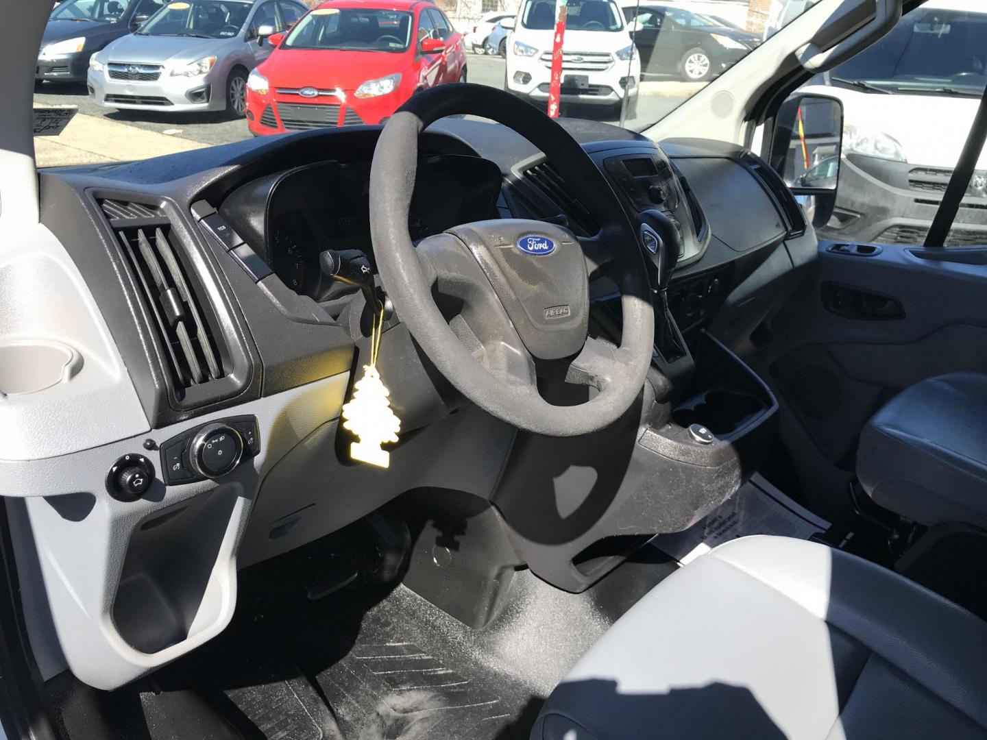 2017 White /Gray Ford Transit 150 Van Low Roof 60/40 Pass. 130-in. WB (1FTYE1ZMXHK) with an 3.7L V6 DOHC 24V engine, 6A transmission, located at 577 Chester Pike, Prospect Park, PA, 19076, (610) 237-1015, 39.886154, -75.302338 - 2017 Ford Transit 150: Ladder racks, multiple pieces of shelving, no side or rear windows, backup camera, FLEET MAINTAINED, runs LIKE NEW! This vehicle comes inspected and has been given a bumper to bumper safety check. It is very clean, reliable, and well maintained. We offer a unique pay plan t - Photo#11