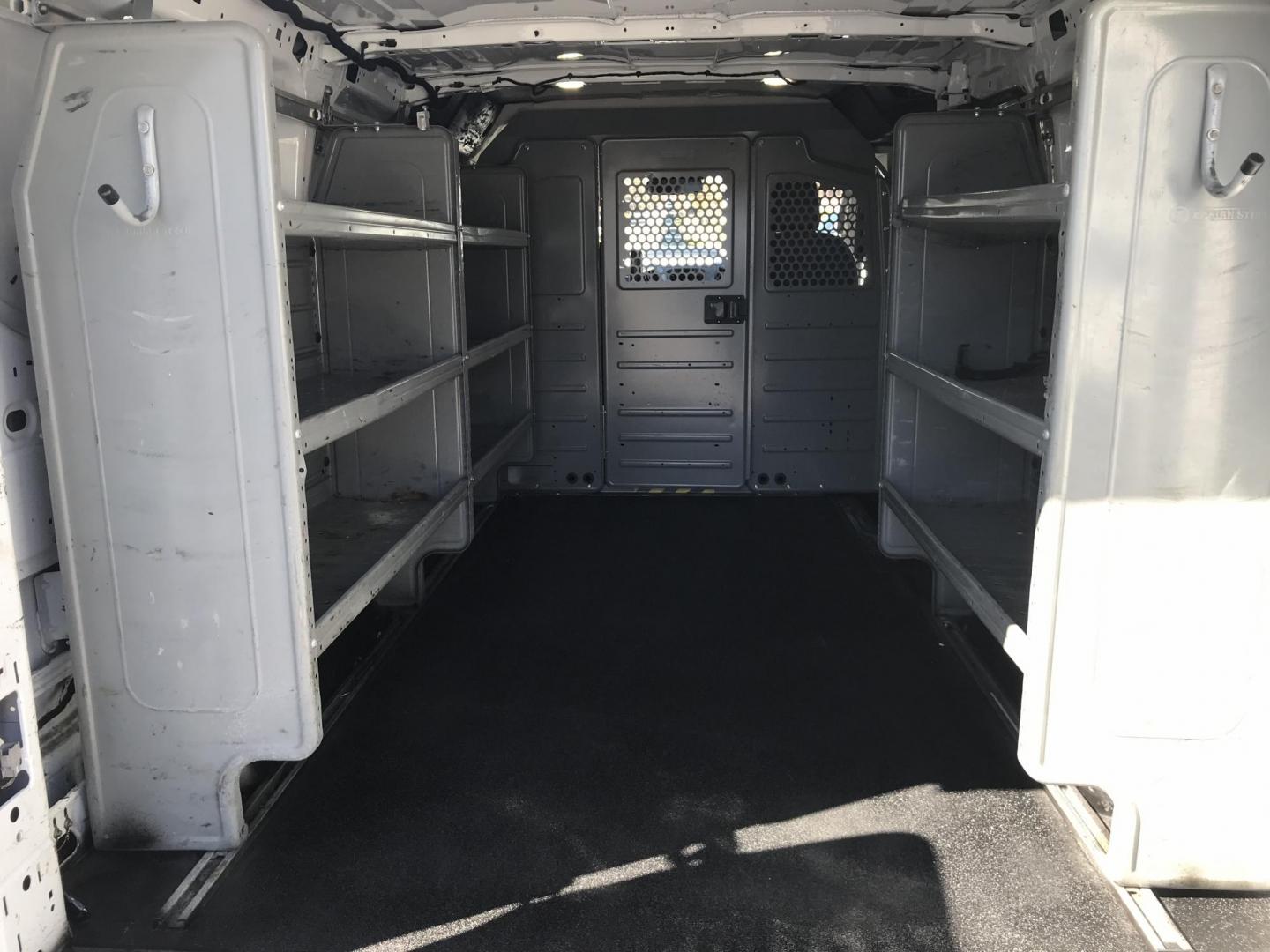 2017 White /Gray Ford Transit 150 Van Low Roof 60/40 Pass. 130-in. WB (1FTYE1ZMXHK) with an 3.7L V6 DOHC 24V engine, 6A transmission, located at 577 Chester Pike, Prospect Park, PA, 19076, (610) 237-1015, 39.886154, -75.302338 - 2017 Ford Transit 150: Ladder racks, multiple pieces of shelving, no side or rear windows, backup camera, FLEET MAINTAINED, runs LIKE NEW! This vehicle comes inspected and has been given a bumper to bumper safety check. It is very clean, reliable, and well maintained. We offer a unique pay plan t - Photo#15