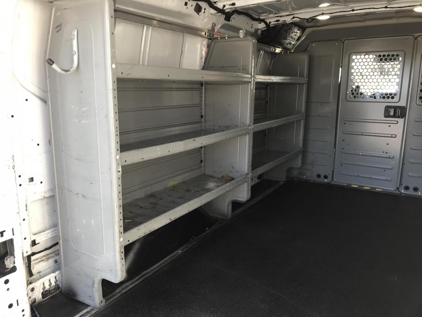 2017 White /Gray Ford Transit 150 Van Low Roof 60/40 Pass. 130-in. WB (1FTYE1ZMXHK) with an 3.7L V6 DOHC 24V engine, 6A transmission, located at 577 Chester Pike, Prospect Park, PA, 19076, (610) 237-1015, 39.886154, -75.302338 - 2017 Ford Transit 150: Ladder racks, multiple pieces of shelving, no side or rear windows, backup camera, FLEET MAINTAINED, runs LIKE NEW! This vehicle comes inspected and has been given a bumper to bumper safety check. It is very clean, reliable, and well maintained. We offer a unique pay plan t - Photo#16