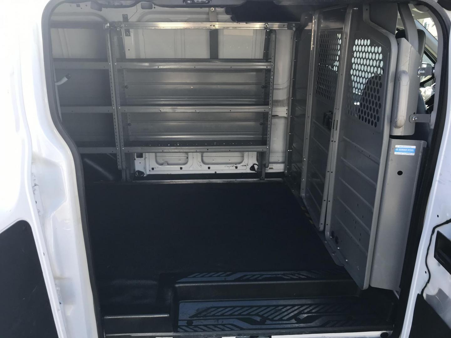 2017 White /Gray Ford Transit 150 Van Low Roof 60/40 Pass. 130-in. WB (1FTYE1ZMXHK) with an 3.7L V6 DOHC 24V engine, 6A transmission, located at 577 Chester Pike, Prospect Park, PA, 19076, (610) 237-1015, 39.886154, -75.302338 - 2017 Ford Transit 150: Ladder racks, multiple pieces of shelving, no side or rear windows, backup camera, FLEET MAINTAINED, runs LIKE NEW! This vehicle comes inspected and has been given a bumper to bumper safety check. It is very clean, reliable, and well maintained. We offer a unique pay plan t - Photo#18