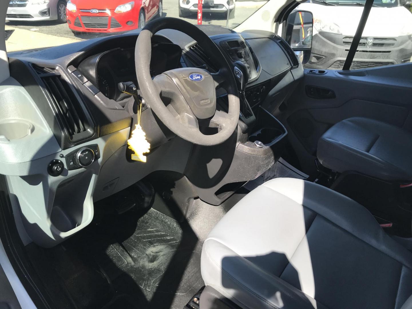 2017 White /Gray Ford Transit 150 Van Low Roof 60/40 Pass. 130-in. WB (1FTYE1ZMXHK) with an 3.7L V6 DOHC 24V engine, 6A transmission, located at 577 Chester Pike, Prospect Park, PA, 19076, (610) 237-1015, 39.886154, -75.302338 - 2017 Ford Transit 150: Ladder racks, multiple pieces of shelving, no side or rear windows, backup camera, FLEET MAINTAINED, runs LIKE NEW! This vehicle comes inspected and has been given a bumper to bumper safety check. It is very clean, reliable, and well maintained. We offer a unique pay plan t - Photo#7