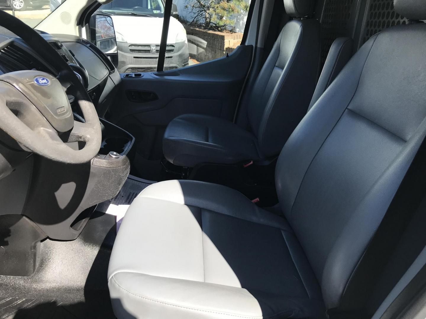 2017 White /Gray Ford Transit 150 Van Low Roof 60/40 Pass. 130-in. WB (1FTYE1ZMXHK) with an 3.7L V6 DOHC 24V engine, 6A transmission, located at 577 Chester Pike, Prospect Park, PA, 19076, (610) 237-1015, 39.886154, -75.302338 - 2017 Ford Transit 150: Ladder racks, multiple pieces of shelving, no side or rear windows, backup camera, FLEET MAINTAINED, runs LIKE NEW! This vehicle comes inspected and has been given a bumper to bumper safety check. It is very clean, reliable, and well maintained. We offer a unique pay plan t - Photo#9