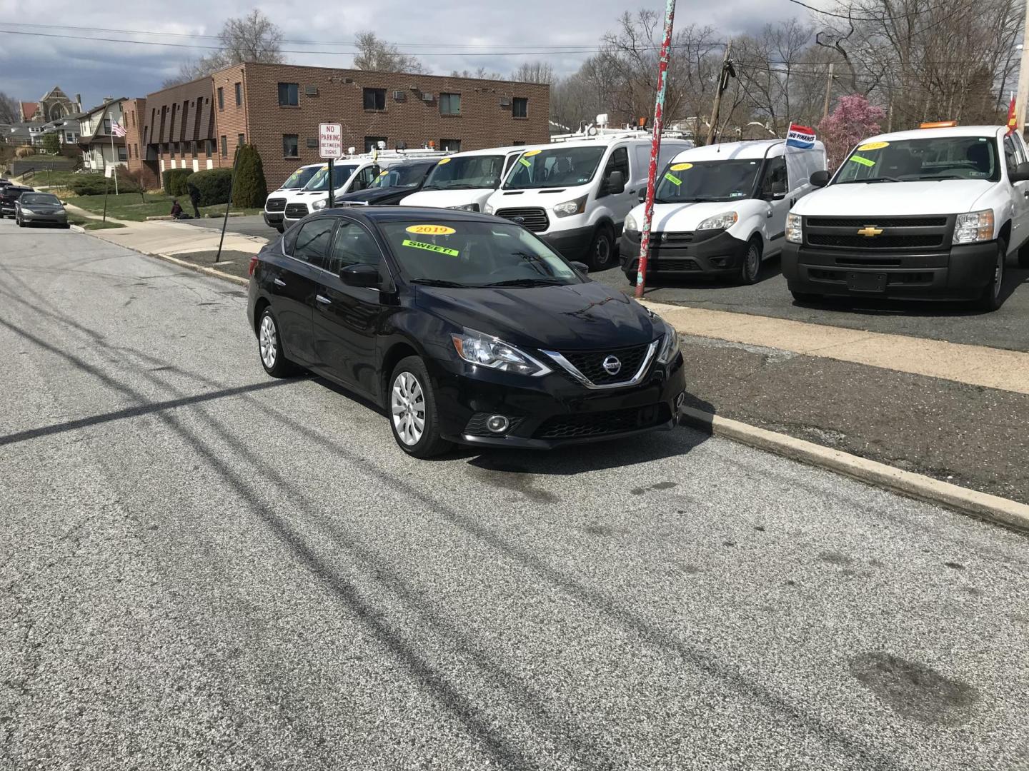 2019 Black Nissan Sentra S (3N1AB7AP6KY) with an 1.8L L4 SFI DOHC 16V engine, CVT transmission, located at 577 Chester Pike, Prospect Park, PA, 19076, (610) 237-1015, 39.886154, -75.302338 - Photo#1