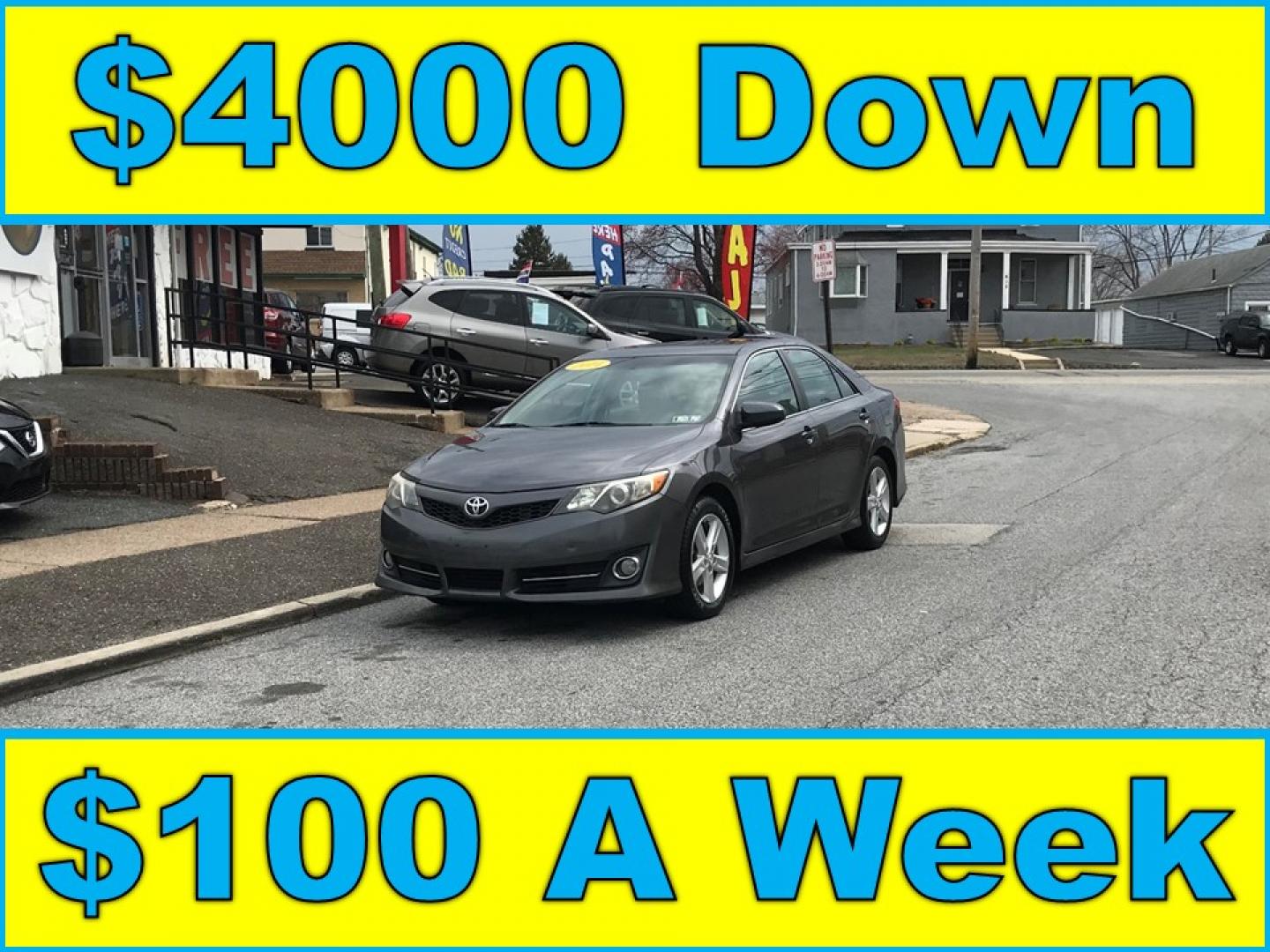 2014 Gray /Black Toyota Camry SE (4T1BF1FK0EU) with an 2.5L L4 DOHC 16V engine, 6-Speed Automatic transmission, located at 577 Chester Pike, Prospect Park, PA, 19076, (610) 237-1015, 39.886154, -75.302338 - Photo#0