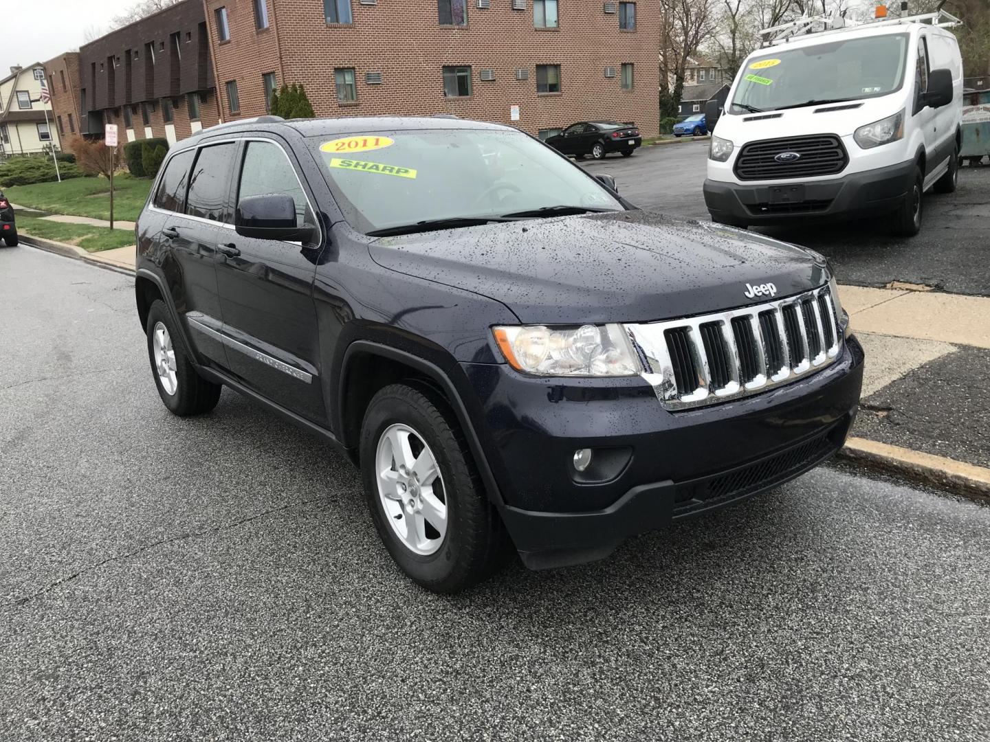 2011 Blue /Gray Jeep Grand Cherokee Laredo 4WD (1J4RR4GG2BC) with an 3.6L V6 DOHC 24V engine, 5-Speed Automatic transmission, located at 577 Chester Pike, Prospect Park, PA, 19076, (610) 237-1015, 39.886154, -75.302338 - Photo#1