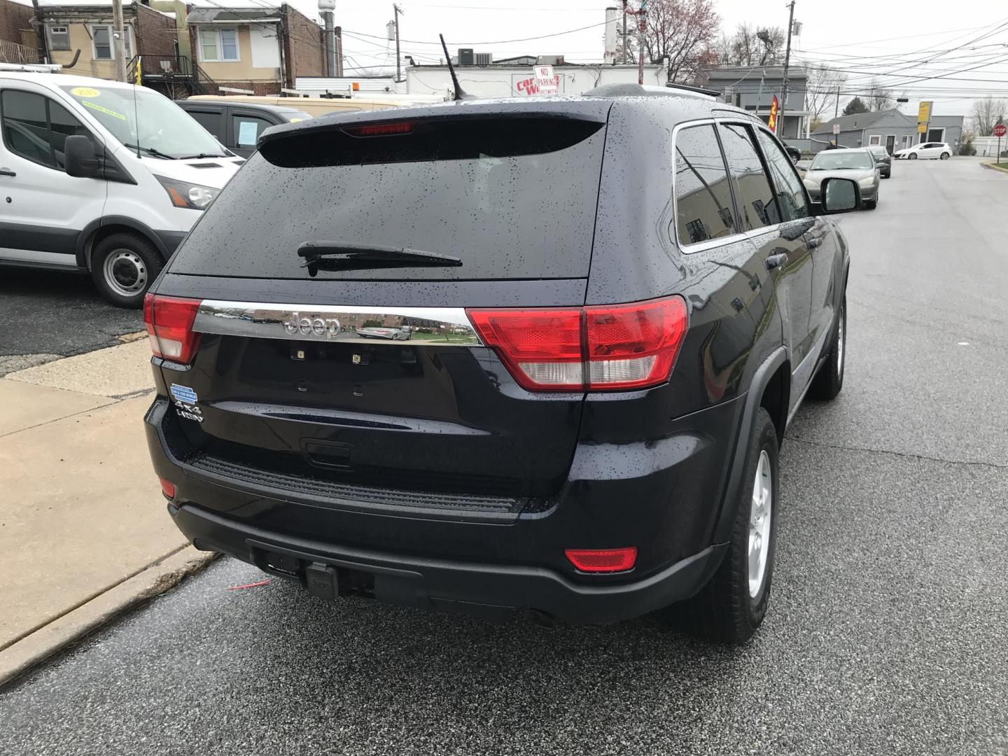 2011 Blue /Gray Jeep Grand Cherokee Laredo 4WD (1J4RR4GG2BC) with an 3.6L V6 DOHC 24V engine, 5-Speed Automatic transmission, located at 577 Chester Pike, Prospect Park, PA, 19076, (610) 237-1015, 39.886154, -75.302338 - Photo#4