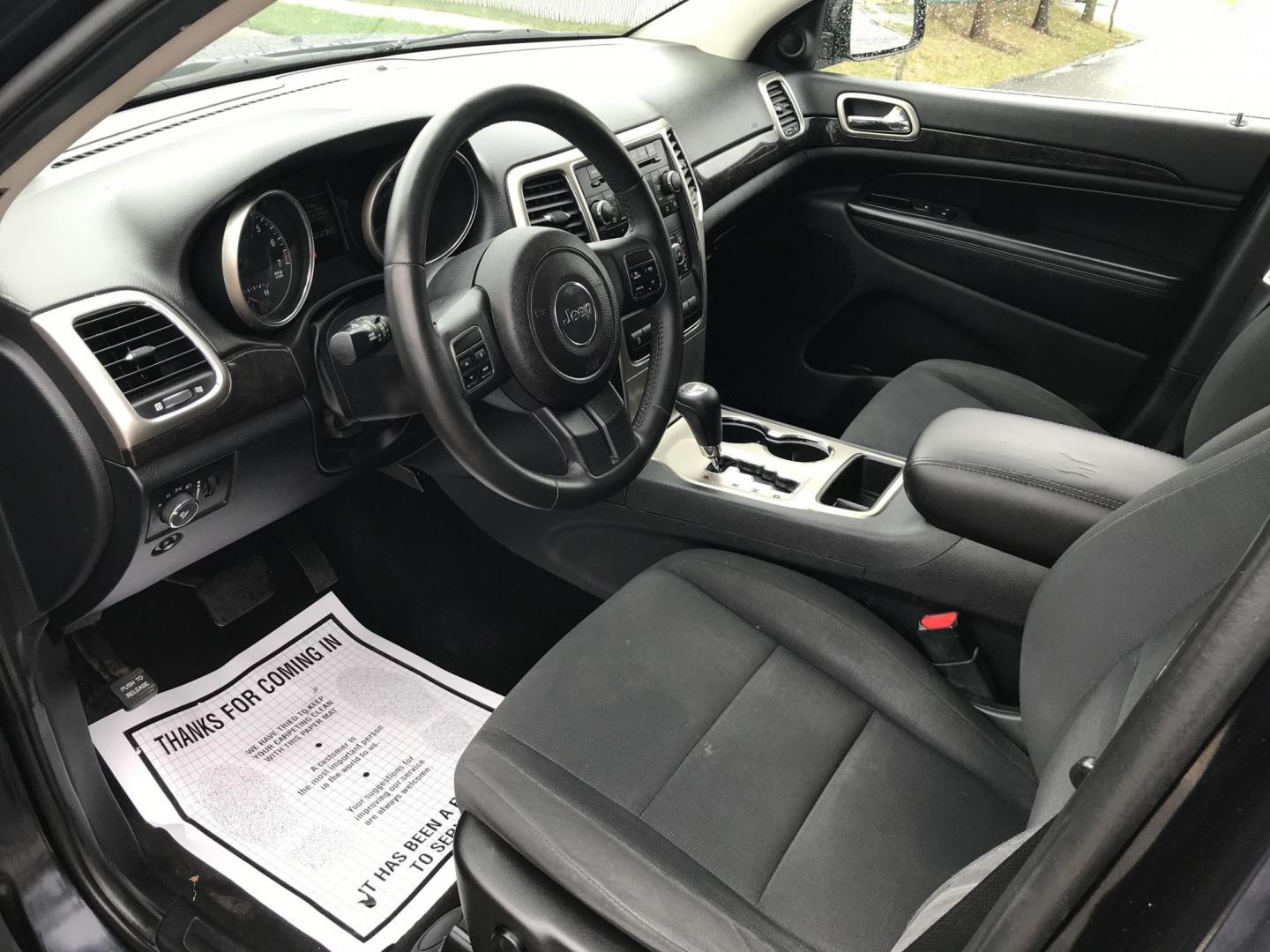 2011 Blue /Gray Jeep Grand Cherokee Laredo 4WD (1J4RR4GG2BC) with an 3.6L V6 DOHC 24V engine, 5-Speed Automatic transmission, located at 577 Chester Pike, Prospect Park, PA, 19076, (610) 237-1015, 39.886154, -75.302338 - Photo#7