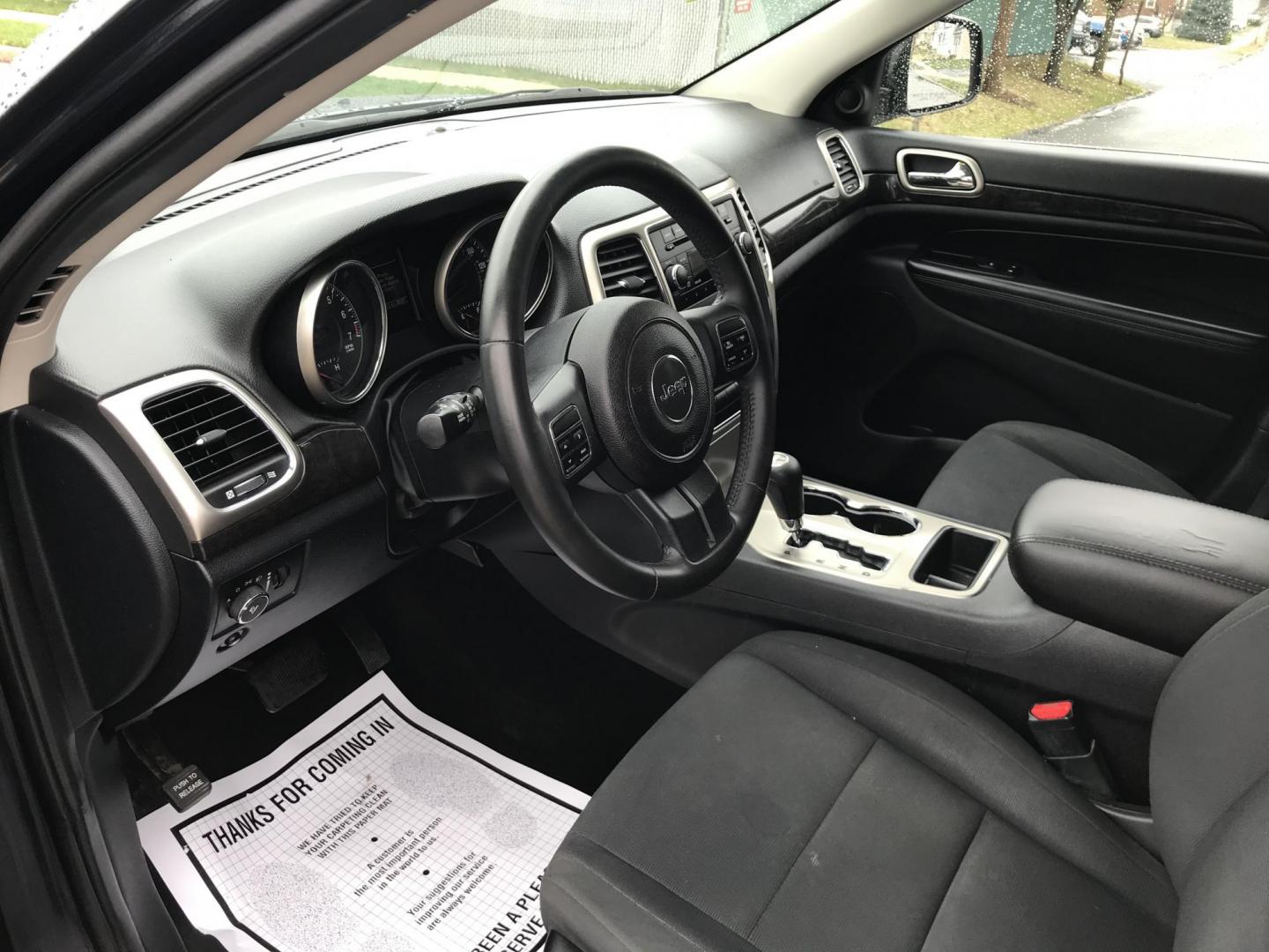 2011 Blue /Gray Jeep Grand Cherokee Laredo 4WD (1J4RR4GG2BC) with an 3.6L V6 DOHC 24V engine, 5-Speed Automatic transmission, located at 577 Chester Pike, Prospect Park, PA, 19076, (610) 237-1015, 39.886154, -75.302338 - Photo#8