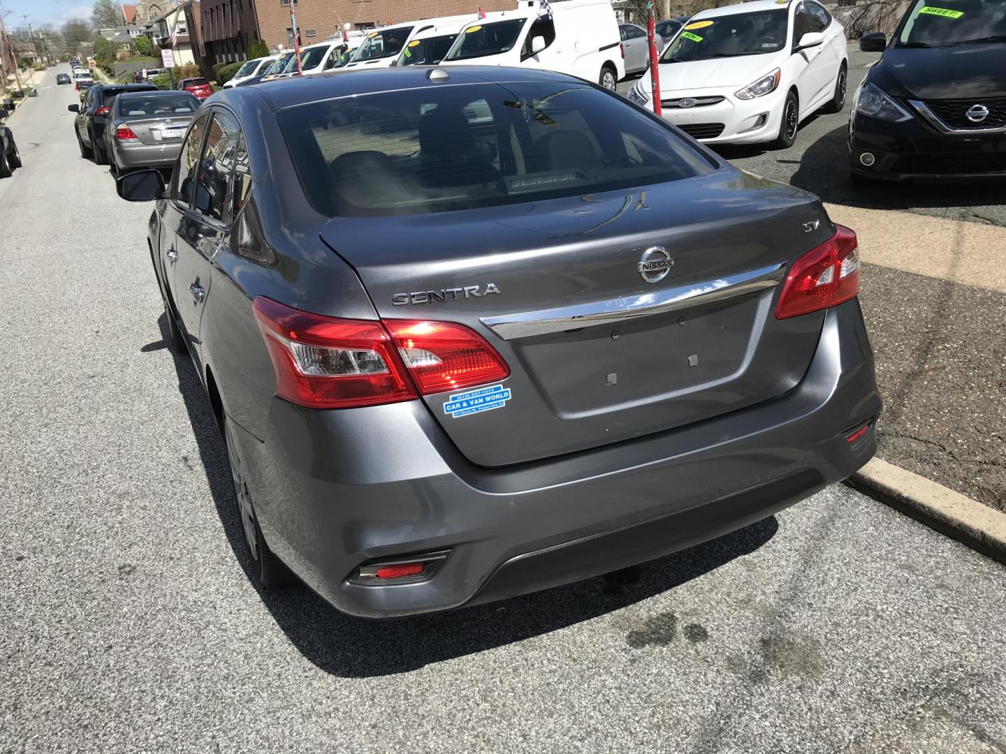 2017 Gray /Gray Nissan Sentra S (3N1AB7AP2HL) with an 1.8L L4 SFI DOHC 16V engine, Automatic transmission, located at 577 Chester Pike, Prospect Park, PA, 19076, (610) 237-1015, 39.886154, -75.302338 - 2017 Nissan Sentra: Backup camera, new PA inspection, great on gas, runs LIKE NEW! This vehicle comes inspected and has been given a bumper to bumper safety check. It is very clean, reliable, and well maintained. We offer a unique pay plan that is known for being the easiest and fastest financing - Photo#4