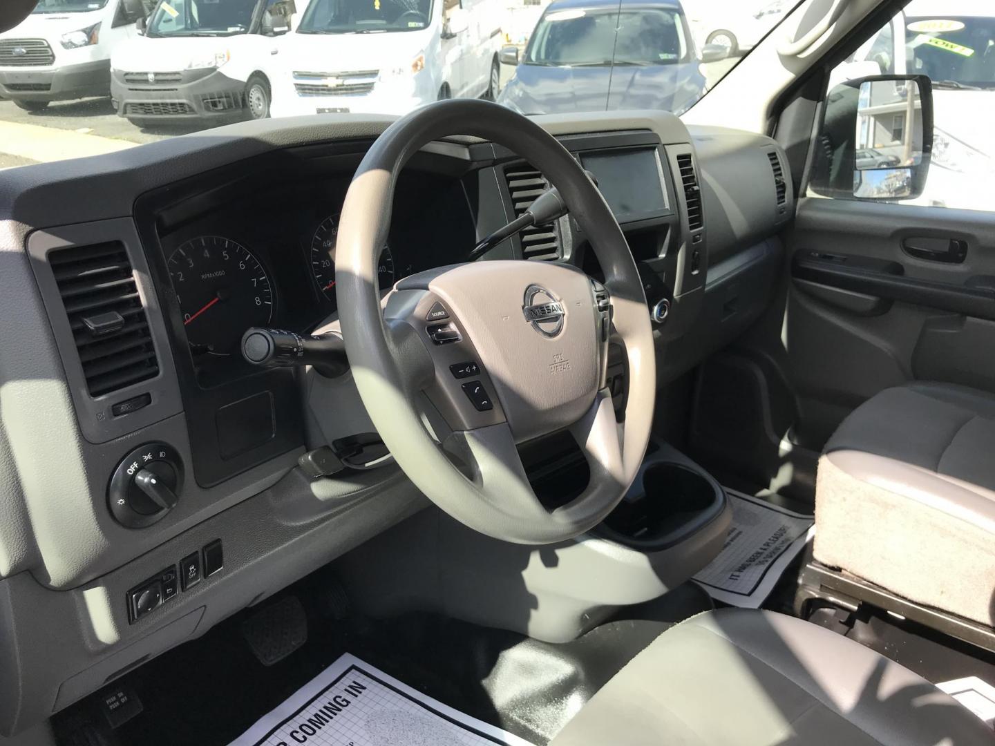 2020 White /Gray Nissan NV Cargo 1500 SV (1N6BF0KM6LN) with an 4.0L V6 engine, 5A transmission, located at 577 Chester Pike, Prospect Park, PA, 19076, (610) 237-1015, 39.886154, -75.302338 - 2020 Nissan NV 1500 Cargo Van: Shelving, backup camera, partition, no side or rear windows, new PA inspection, FLEET MAINTAINED, runs LIKE NEW! This vehicle comes inspected and has been given a bumper to bumper safety check. It is very clean, reliable, and well maintained. We offer a unique pay p - Photo#10