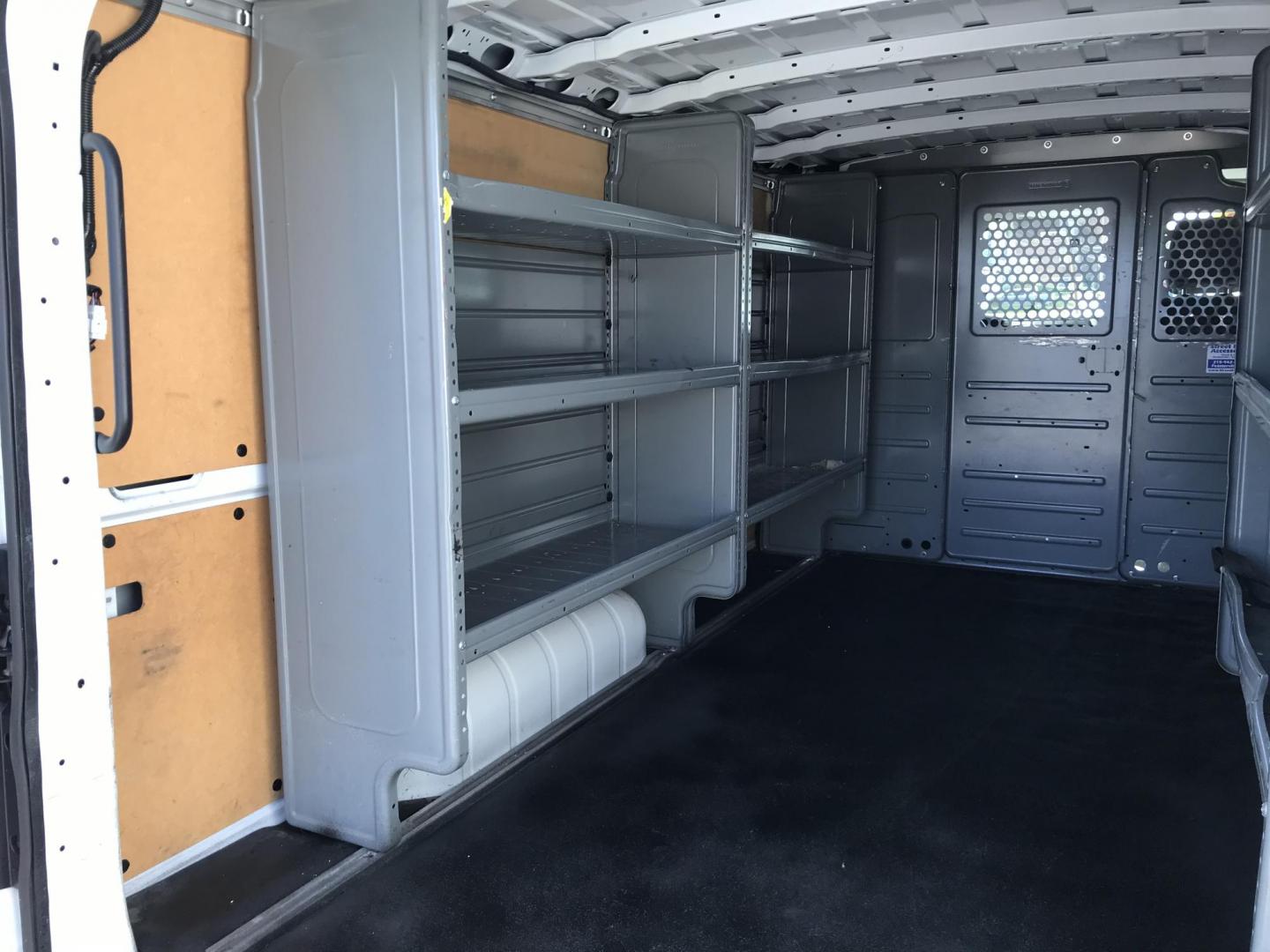 2020 White /Gray Nissan NV Cargo 1500 SV (1N6BF0KM6LN) with an 4.0L V6 engine, 5A transmission, located at 577 Chester Pike, Prospect Park, PA, 19076, (610) 237-1015, 39.886154, -75.302338 - 2020 Nissan NV 1500 Cargo Van: Shelving, backup camera, partition, no side or rear windows, new PA inspection, FLEET MAINTAINED, runs LIKE NEW! This vehicle comes inspected and has been given a bumper to bumper safety check. It is very clean, reliable, and well maintained. We offer a unique pay p - Photo#16