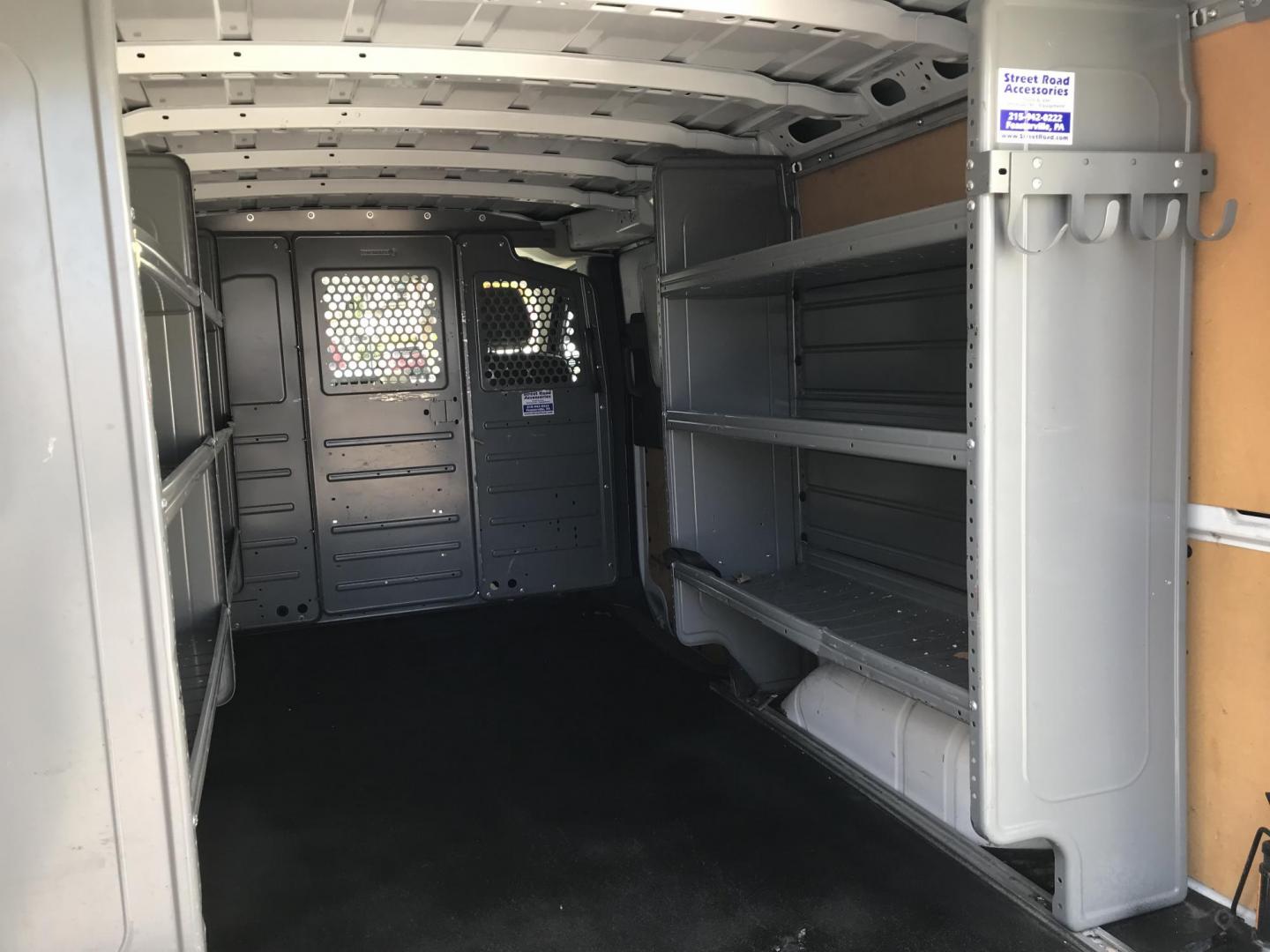 2020 White /Gray Nissan NV Cargo 1500 SV (1N6BF0KM6LN) with an 4.0L V6 engine, 5A transmission, located at 577 Chester Pike, Prospect Park, PA, 19076, (610) 237-1015, 39.886154, -75.302338 - 2020 Nissan NV 1500 Cargo Van: Shelving, backup camera, partition, no side or rear windows, new PA inspection, FLEET MAINTAINED, runs LIKE NEW! This vehicle comes inspected and has been given a bumper to bumper safety check. It is very clean, reliable, and well maintained. We offer a unique pay p - Photo#20