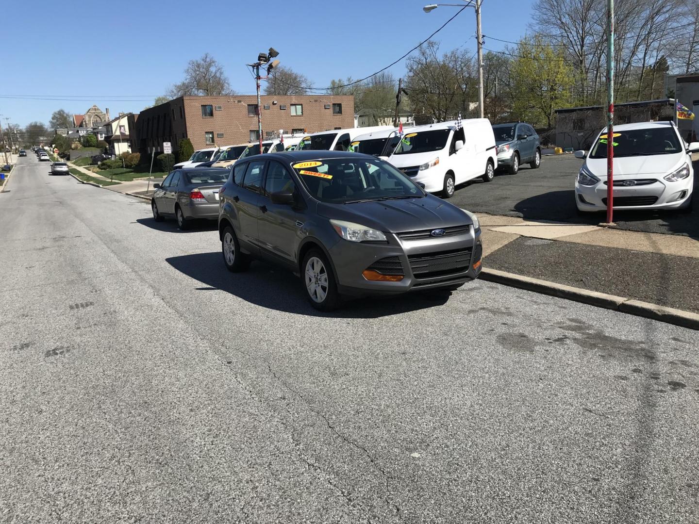 2014 Gray /Gray Ford Escape S FWD (1FMCU0F72EU) with an 2.5L L4 DOHC 16V engine, 6-Speed Automatic transmission, located at 577 Chester Pike, Prospect Park, PA, 19076, (610) 237-1015, 39.886154, -75.302338 - 2014 Ford Escape S: Backup camera, only 121k miles, new PA inspection, great on gas, runs LIKE NEW! This vehicle comes inspected and has been given a bumper to bumper safety check. It is very clean, reliable, and well maintained. We offer a unique pay plan that is known for being the easiest and - Photo#3