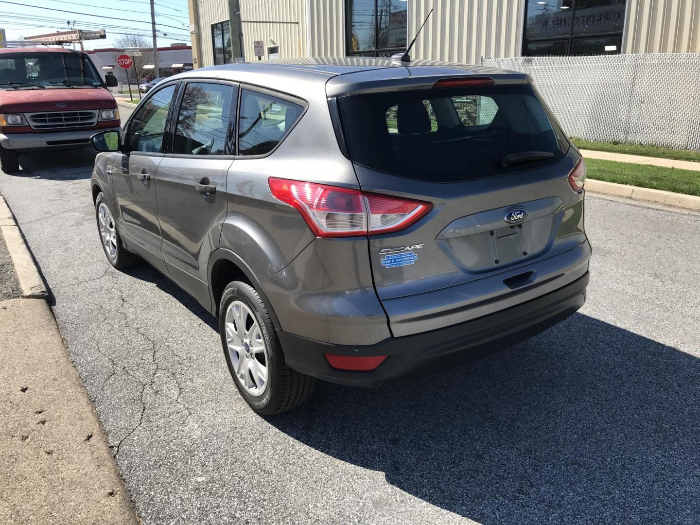 2014 Gray /Gray Ford Escape S FWD (1FMCU0F72EU) with an 2.5L L4 DOHC 16V engine, 6-Speed Automatic transmission, located at 577 Chester Pike, Prospect Park, PA, 19076, (610) 237-1015, 39.886154, -75.302338 - 2014 Ford Escape S: Backup camera, only 121k miles, new PA inspection, great on gas, runs LIKE NEW! This vehicle comes inspected and has been given a bumper to bumper safety check. It is very clean, reliable, and well maintained. We offer a unique pay plan that is known for being the easiest and - Photo#5