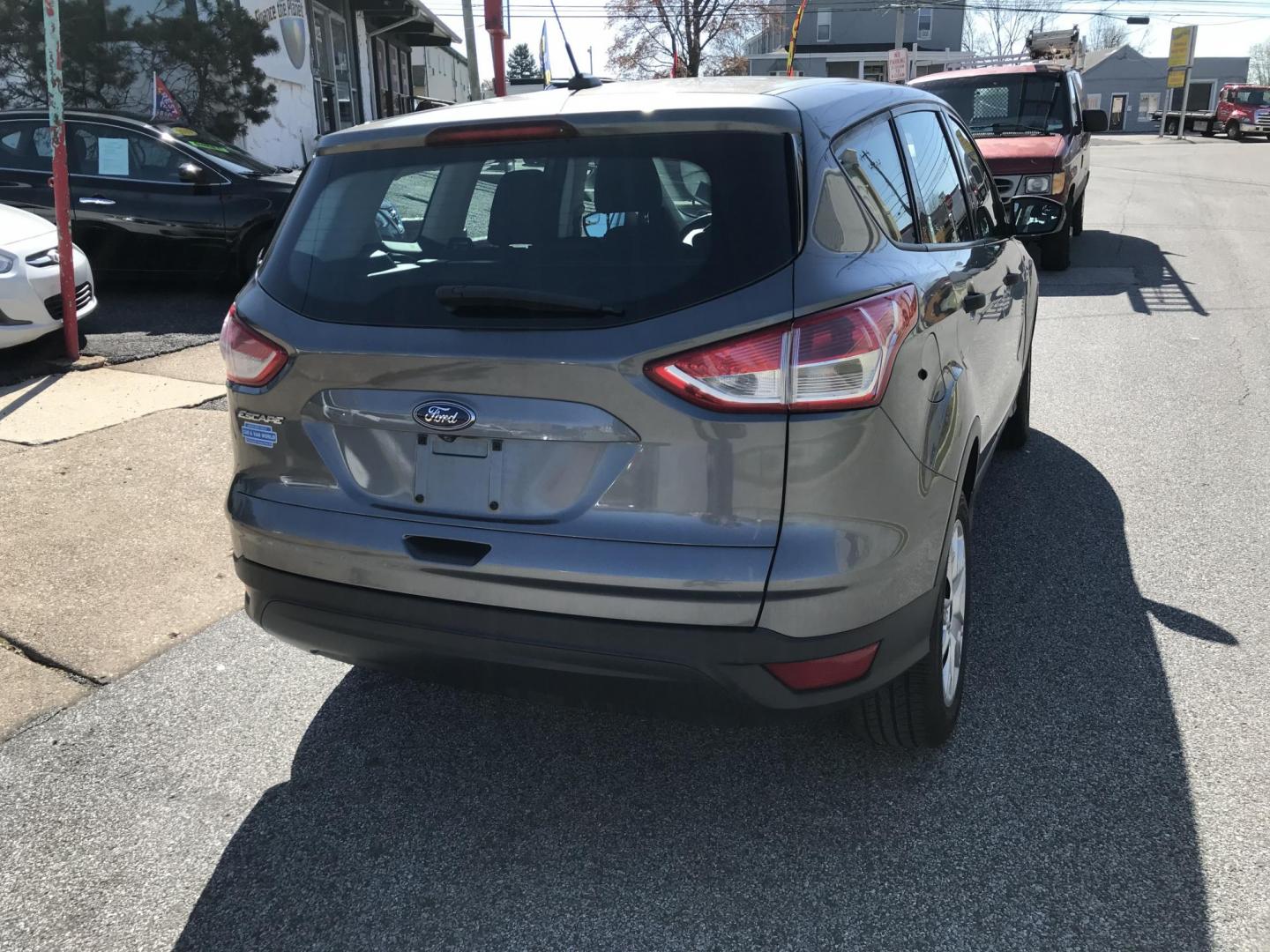 2014 Gray /Gray Ford Escape S FWD (1FMCU0F72EU) with an 2.5L L4 DOHC 16V engine, 6-Speed Automatic transmission, located at 577 Chester Pike, Prospect Park, PA, 19076, (610) 237-1015, 39.886154, -75.302338 - 2014 Ford Escape S: Backup camera, only 121k miles, new PA inspection, great on gas, runs LIKE NEW! This vehicle comes inspected and has been given a bumper to bumper safety check. It is very clean, reliable, and well maintained. We offer a unique pay plan that is known for being the easiest and - Photo#6