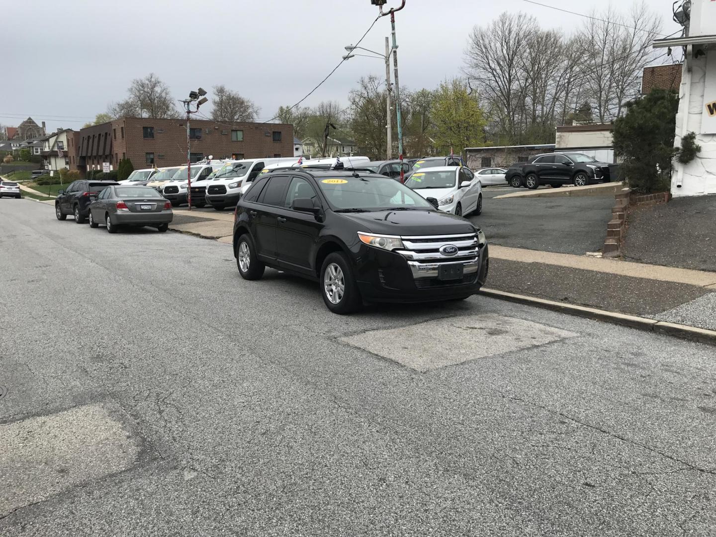 2011 Black /Black Ford Edge SE (2FMDK3GC0BB) with an 3.5L V6 DOHC 24V engine, 6-Speed Automatic transmission, located at 577 Chester Pike, Prospect Park, PA, 19076, (610) 237-1015, 39.886154, -75.302338 - 2011 Ford Edge: Only 112k miles, new PA inspection, SUPER CLEAN, runs LIKE NEW! This vehicle comes inspected and has been given a bumper to bumper safety check. It is very clean, reliable, and well maintained. We offer a unique pay plan that is known for being the easiest and fastest financing op - Photo#1