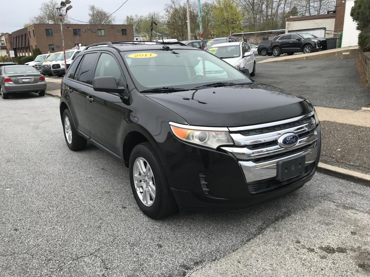 2011 Black /Black Ford Edge SE (2FMDK3GC0BB) with an 3.5L V6 DOHC 24V engine, 6-Speed Automatic transmission, located at 577 Chester Pike, Prospect Park, PA, 19076, (610) 237-1015, 39.886154, -75.302338 - 2011 Ford Edge: Only 112k miles, new PA inspection, SUPER CLEAN, runs LIKE NEW! This vehicle comes inspected and has been given a bumper to bumper safety check. It is very clean, reliable, and well maintained. We offer a unique pay plan that is known for being the easiest and fastest financing op - Photo#2