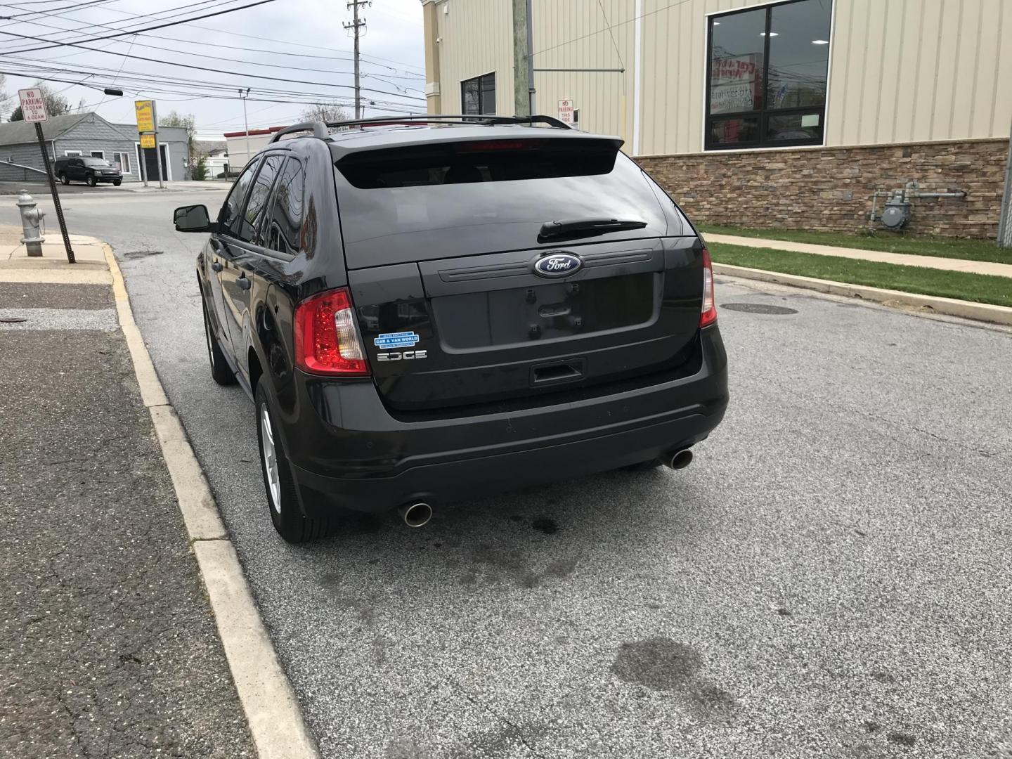 2011 Black /Black Ford Edge SE (2FMDK3GC0BB) with an 3.5L V6 DOHC 24V engine, 6-Speed Automatic transmission, located at 577 Chester Pike, Prospect Park, PA, 19076, (610) 237-1015, 39.886154, -75.302338 - 2011 Ford Edge: Only 112k miles, new PA inspection, SUPER CLEAN, runs LIKE NEW! This vehicle comes inspected and has been given a bumper to bumper safety check. It is very clean, reliable, and well maintained. We offer a unique pay plan that is known for being the easiest and fastest financing op - Photo#3
