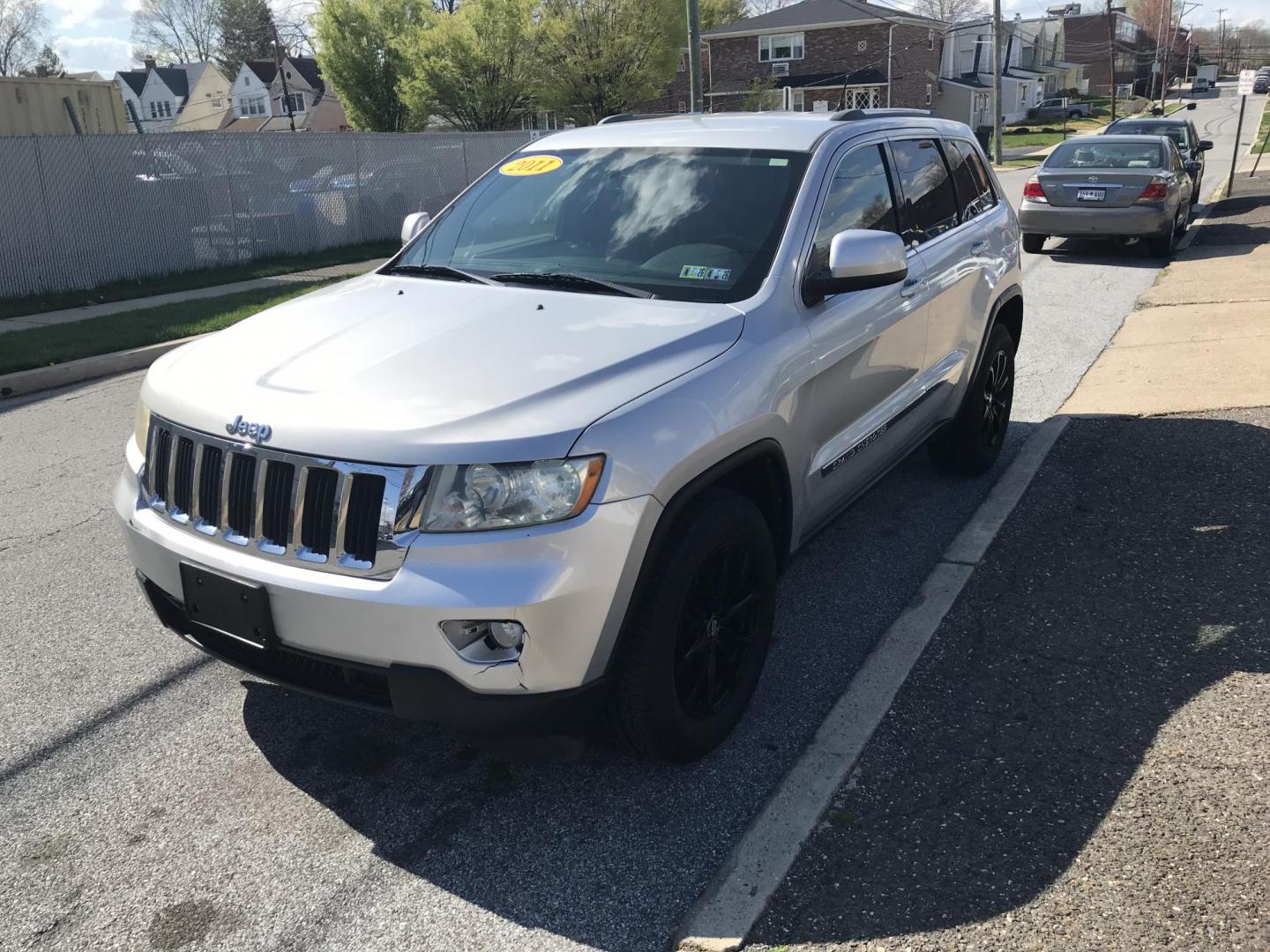2011 Silver /Black Jeep Grand Cherokee Laredo 4WD (1J4RR4GG1BC) with an 3.6L V6 DOHC 24V engine, 5-Speed Automatic transmission, located at 577 Chester Pike, Prospect Park, PA, 19076, (610) 237-1015, 39.886154, -75.302338 - 2011 Jeep Grand Cherokee Laredo: 4x4, backup camera, black leather interior, runs LIKE NEW! This vehicle comes inspected and has been given a bumper to bumper safety check. It is very clean, reliable, and well maintained. We offer a unique pay plan that is known for being the easiest and fastest - Photo#2