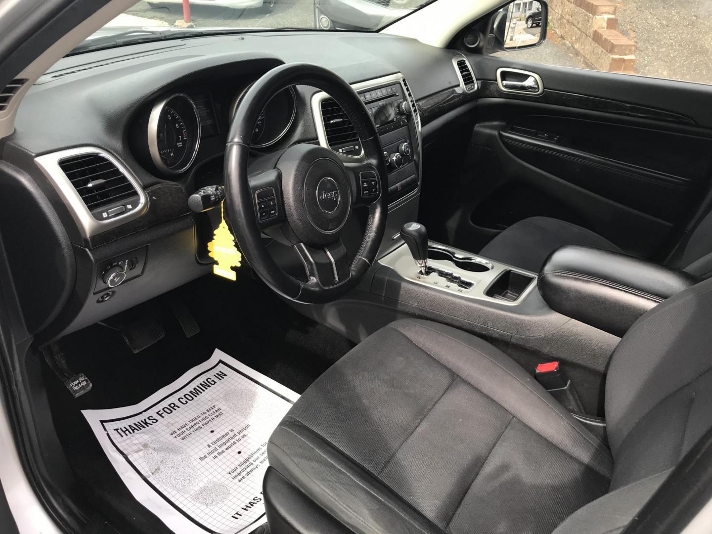 2011 Silver /Gray Jeep Grand Cherokee Laredo 4WD (1J4RR4GG8BC) with an 3.6L V6 DOHC 24V engine, 5-Speed Automatic transmission, located at 577 Chester Pike, Prospect Park, PA, 19076, (610) 237-1015, 39.886154, -75.302338 - 2011 Jeep Grand Cherokee Laredo: Only 106k miles, remote start, 4x4, new PA inspection, SUPER CLEAN, runs LIKE NEW! This vehicle comes inspected and has been given a bumper to bumper safety check. It is very clean, reliable, and well maintained. We offer a unique pay plan that is known for being - Photo#8