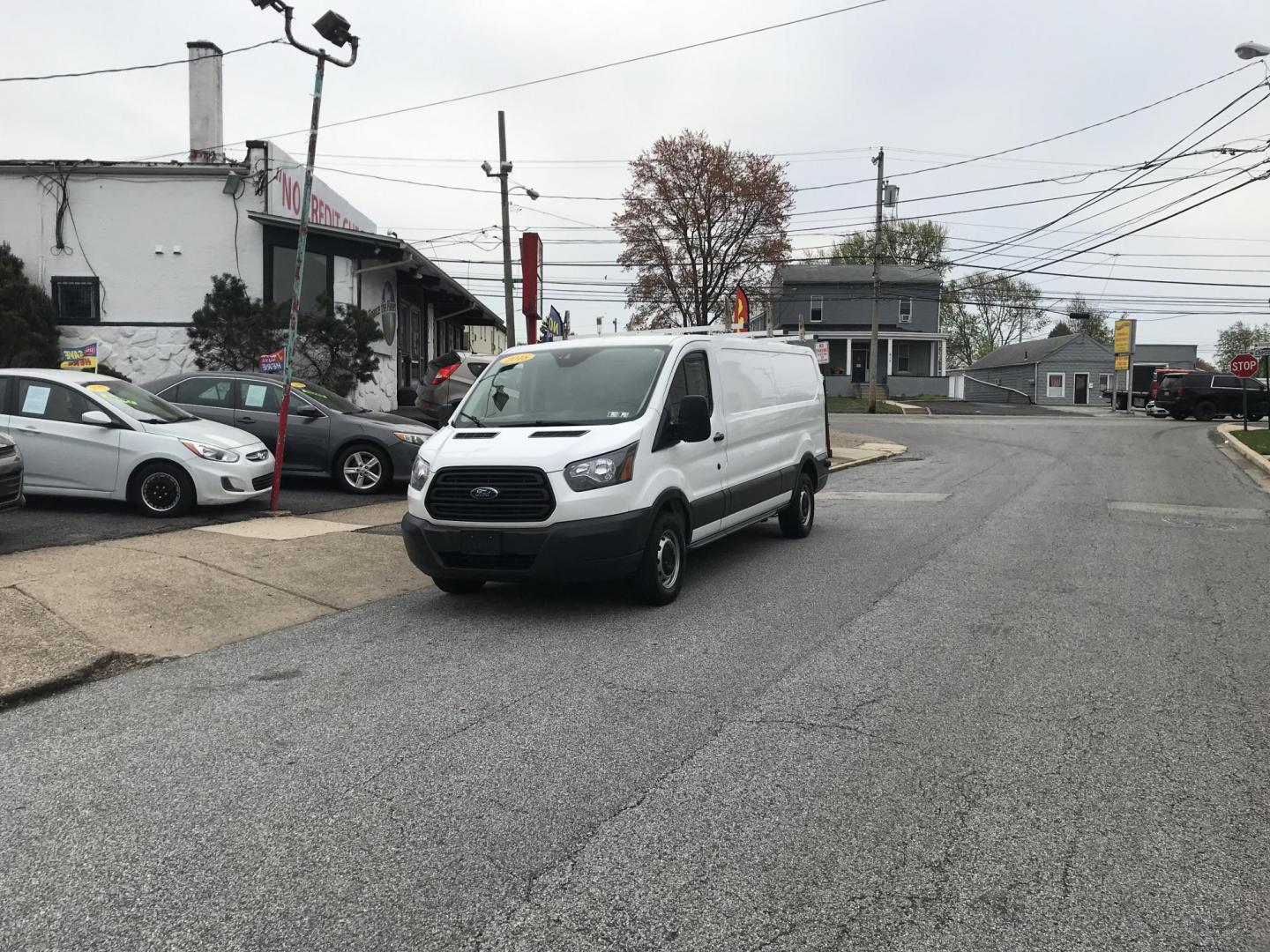 2018 White /Gray Ford Transit 150 Van Low Roof 60/40 Pass. 148-in. WB (1FTYE9ZG6JK) with an 3.5L V6 DOHC 24V engine, 6A transmission, located at 577 Chester Pike, Prospect Park, PA, 19076, (610) 237-1015, 39.886154, -75.302338 - 2018 Ford Transit 150: Ladder racks, shelving, heavy duty partition, no side or rear windows, new PA inspection, FLEET MAINTAINED! This vehicle comes inspected and has been given a bumper to bumper safety check. It is very clean, reliable, and well maintained. We offer a unique pay plan that is k - Photo#1