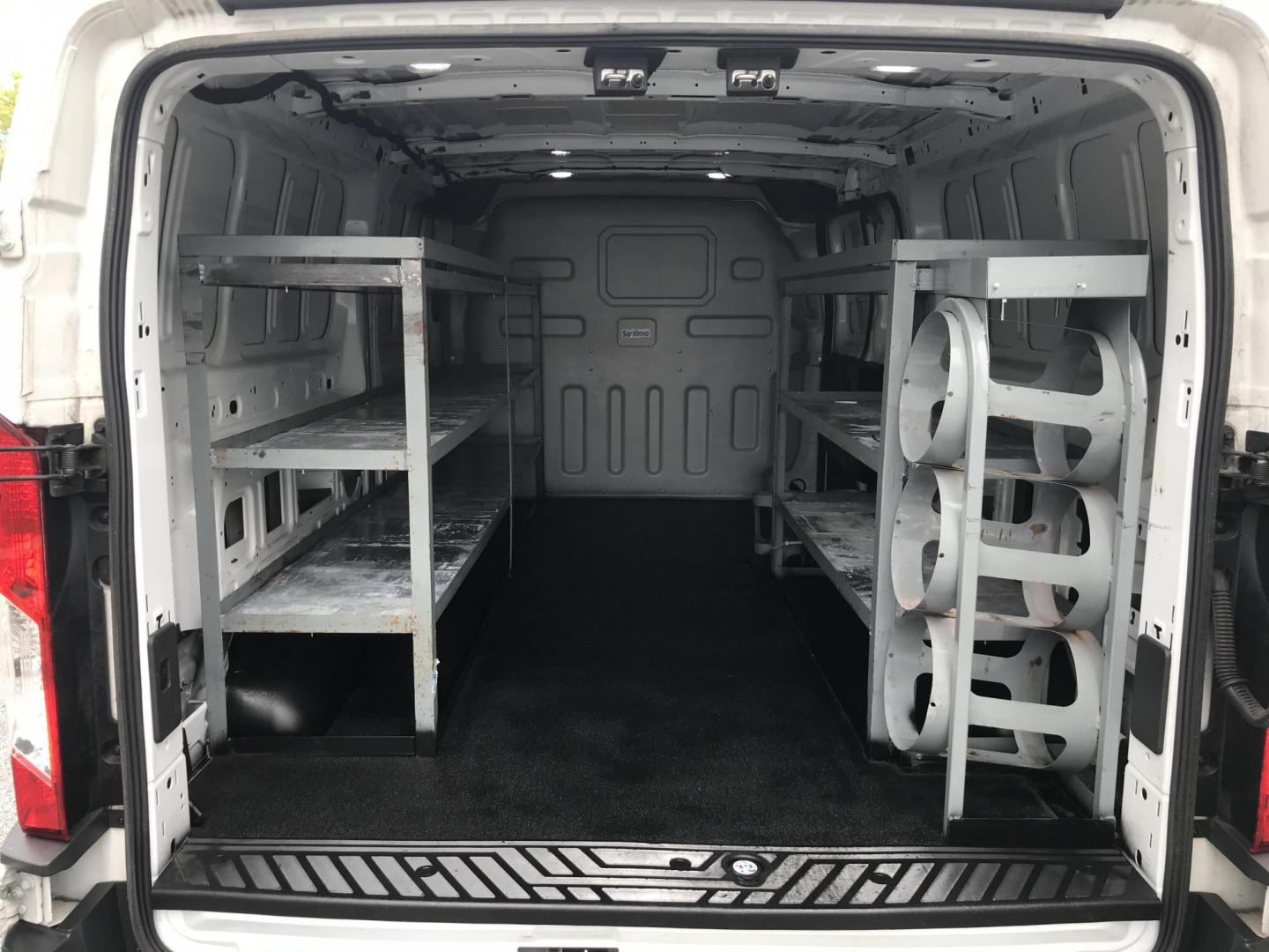2018 White /Gray Ford Transit 150 Van Low Roof 60/40 Pass. 148-in. WB (1FTYE9ZG6JK) with an 3.5L V6 DOHC 24V engine, 6A transmission, located at 577 Chester Pike, Prospect Park, PA, 19076, (610) 237-1015, 39.886154, -75.302338 - 2018 Ford Transit 150: Ladder racks, shelving, heavy duty partition, no side or rear windows, new PA inspection, FLEET MAINTAINED! This vehicle comes inspected and has been given a bumper to bumper safety check. It is very clean, reliable, and well maintained. We offer a unique pay plan that is k - Photo#14