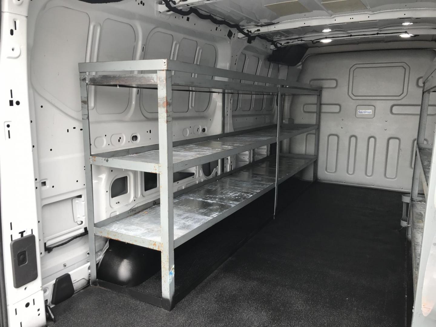2018 White /Gray Ford Transit 150 Van Low Roof 60/40 Pass. 148-in. WB (1FTYE9ZG6JK) with an 3.5L V6 DOHC 24V engine, 6A transmission, located at 577 Chester Pike, Prospect Park, PA, 19076, (610) 237-1015, 39.886154, -75.302338 - 2018 Ford Transit 150: Ladder racks, shelving, heavy duty partition, no side or rear windows, new PA inspection, FLEET MAINTAINED! This vehicle comes inspected and has been given a bumper to bumper safety check. It is very clean, reliable, and well maintained. We offer a unique pay plan that is k - Photo#16