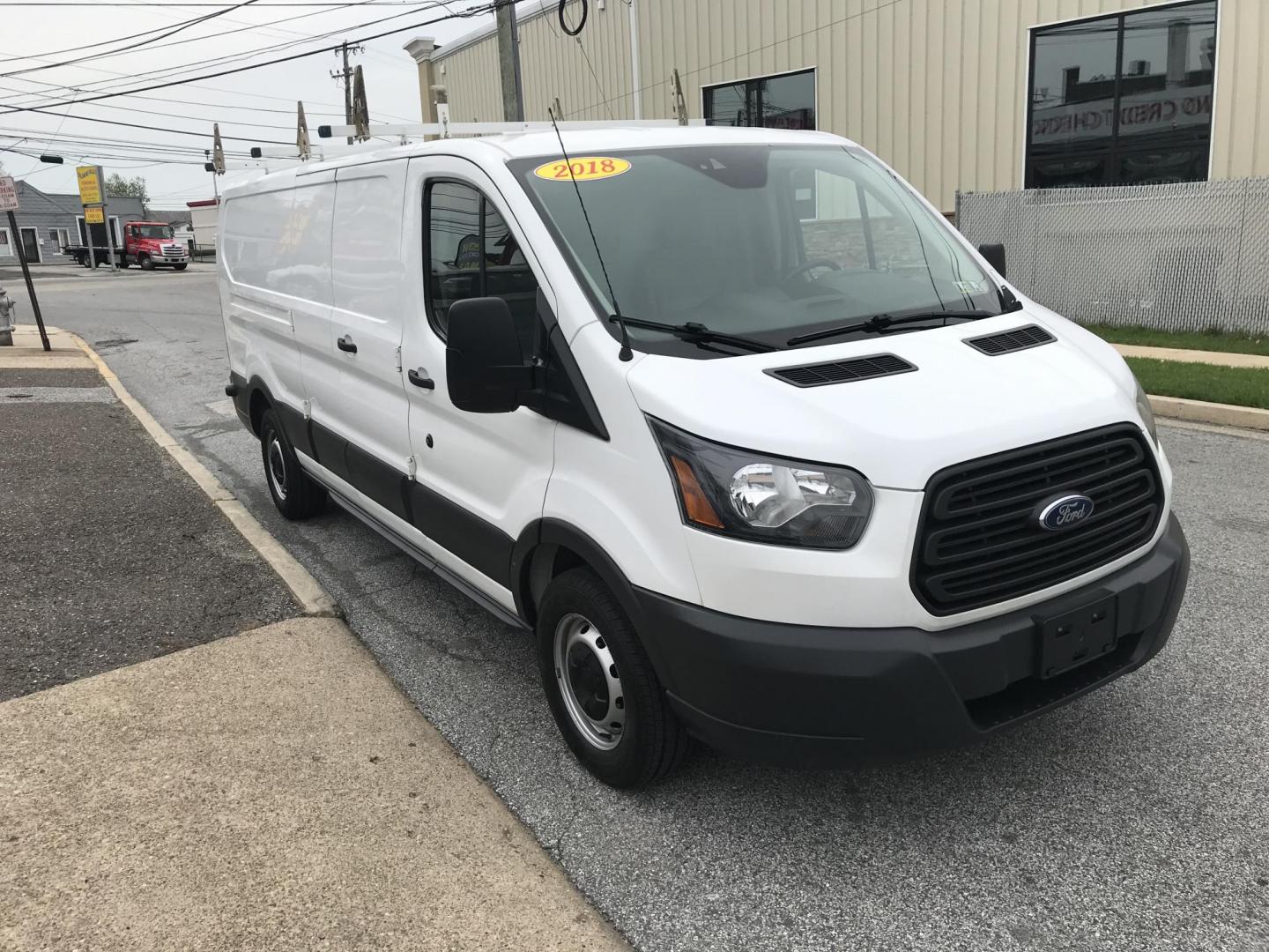2018 White /Gray Ford Transit 150 Van Low Roof 60/40 Pass. 148-in. WB (1FTYE9ZG6JK) with an 3.5L V6 DOHC 24V engine, 6A transmission, located at 577 Chester Pike, Prospect Park, PA, 19076, (610) 237-1015, 39.886154, -75.302338 - 2018 Ford Transit 150: Ladder racks, shelving, heavy duty partition, no side or rear windows, new PA inspection, FLEET MAINTAINED! This vehicle comes inspected and has been given a bumper to bumper safety check. It is very clean, reliable, and well maintained. We offer a unique pay plan that is k - Photo#3