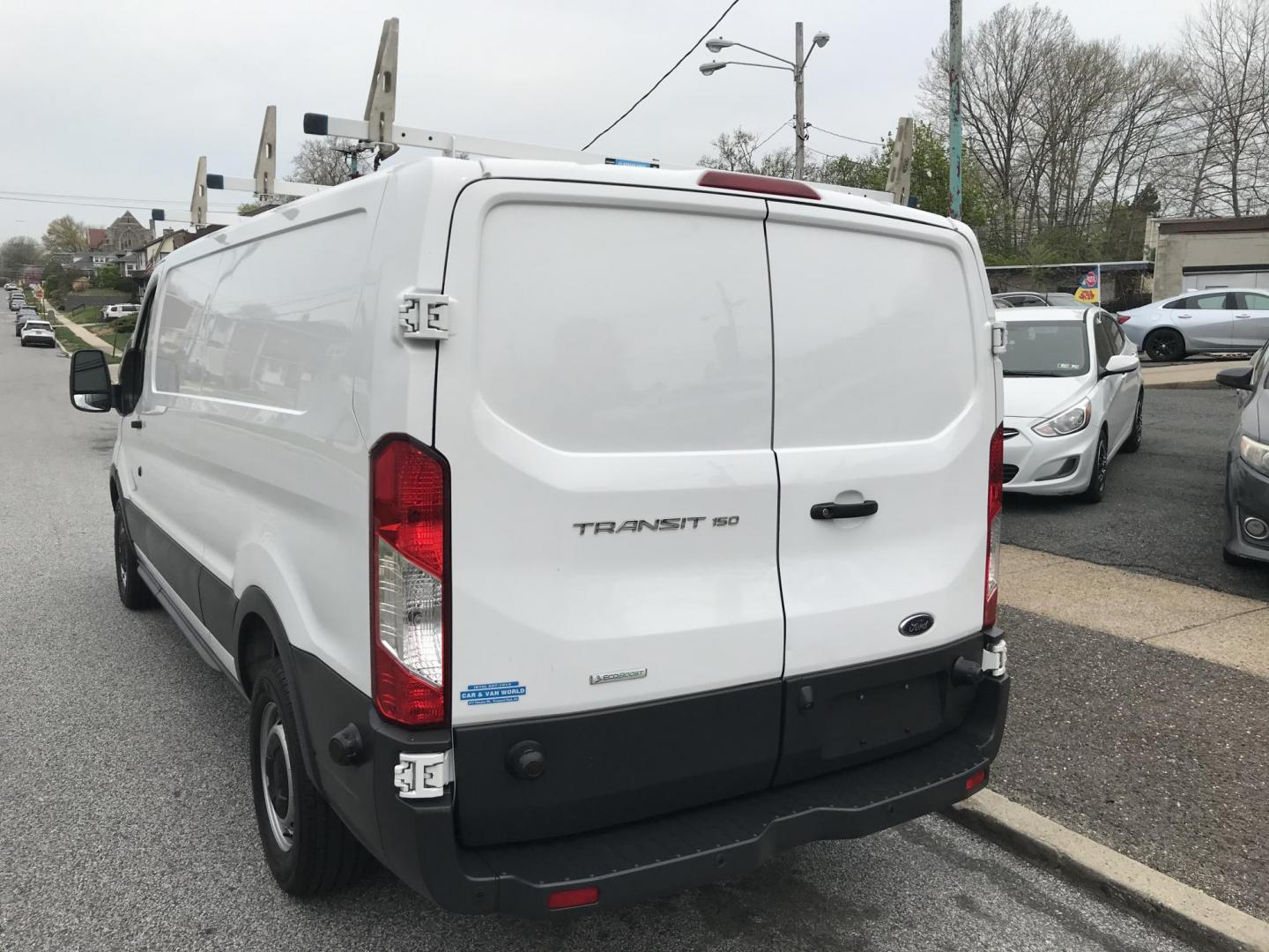 2018 White /Gray Ford Transit 150 Van Low Roof 60/40 Pass. 148-in. WB (1FTYE9ZG6JK) with an 3.5L V6 DOHC 24V engine, 6A transmission, located at 577 Chester Pike, Prospect Park, PA, 19076, (610) 237-1015, 39.886154, -75.302338 - 2018 Ford Transit 150: Ladder racks, shelving, heavy duty partition, no side or rear windows, new PA inspection, FLEET MAINTAINED! This vehicle comes inspected and has been given a bumper to bumper safety check. It is very clean, reliable, and well maintained. We offer a unique pay plan that is k - Photo#5