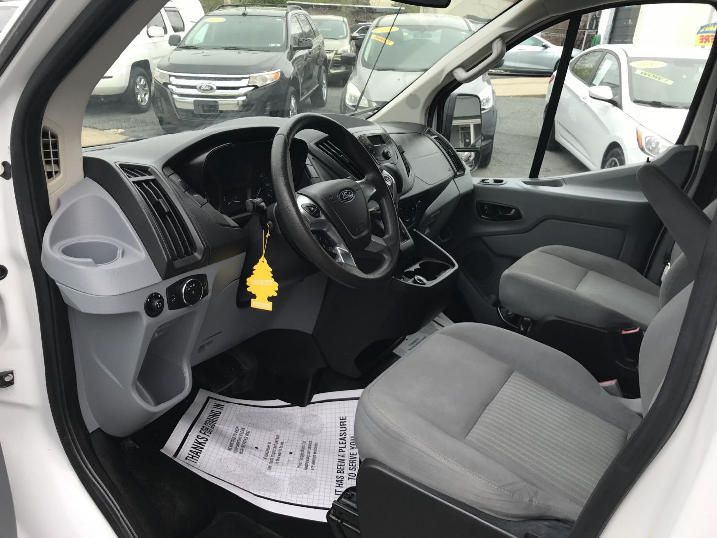 2018 White /Gray Ford Transit 150 Van Low Roof 60/40 Pass. 148-in. WB (1FTYE9ZG6JK) with an 3.5L V6 DOHC 24V engine, 6A transmission, located at 577 Chester Pike, Prospect Park, PA, 19076, (610) 237-1015, 39.886154, -75.302338 - 2018 Ford Transit 150: Ladder racks, shelving, heavy duty partition, no side or rear windows, new PA inspection, FLEET MAINTAINED! This vehicle comes inspected and has been given a bumper to bumper safety check. It is very clean, reliable, and well maintained. We offer a unique pay plan that is k - Photo#8