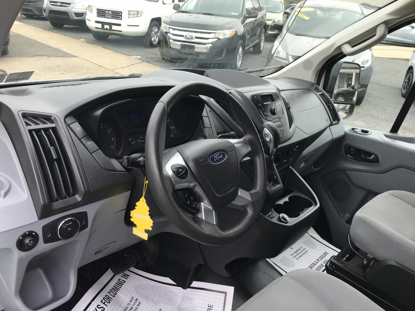 2018 White /Gray Ford Transit 150 Van Low Roof 60/40 Pass. 148-in. WB (1FTYE9ZG6JK) with an 3.5L V6 DOHC 24V engine, 6A transmission, located at 577 Chester Pike, Prospect Park, PA, 19076, (610) 237-1015, 39.886154, -75.302338 - 2018 Ford Transit 150: Ladder racks, shelving, heavy duty partition, no side or rear windows, new PA inspection, FLEET MAINTAINED! This vehicle comes inspected and has been given a bumper to bumper safety check. It is very clean, reliable, and well maintained. We offer a unique pay plan that is k - Photo#9